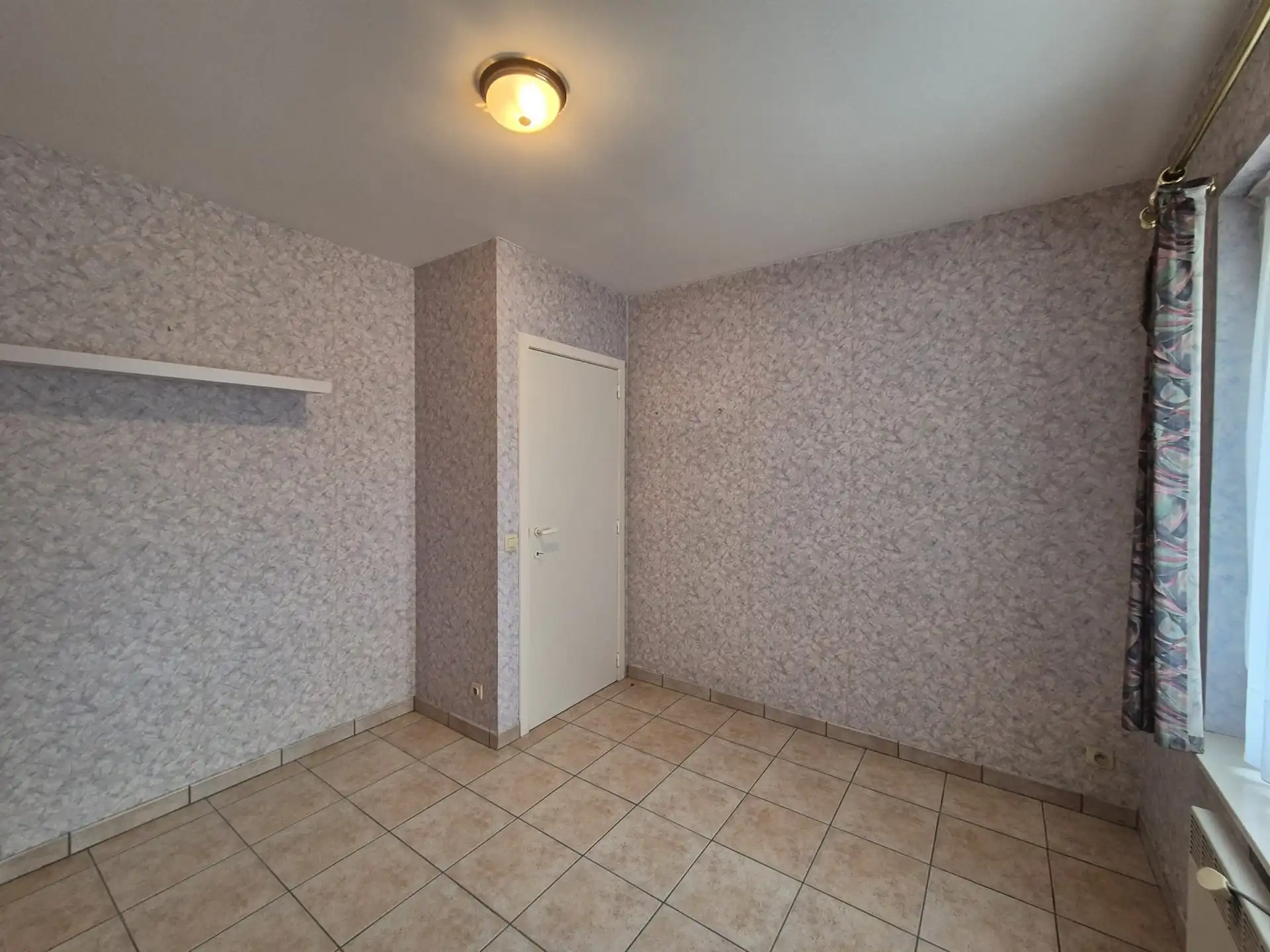 Ruim appartement met garage gelegen op het eerste verdiep vlakbij de Warande. foto 17