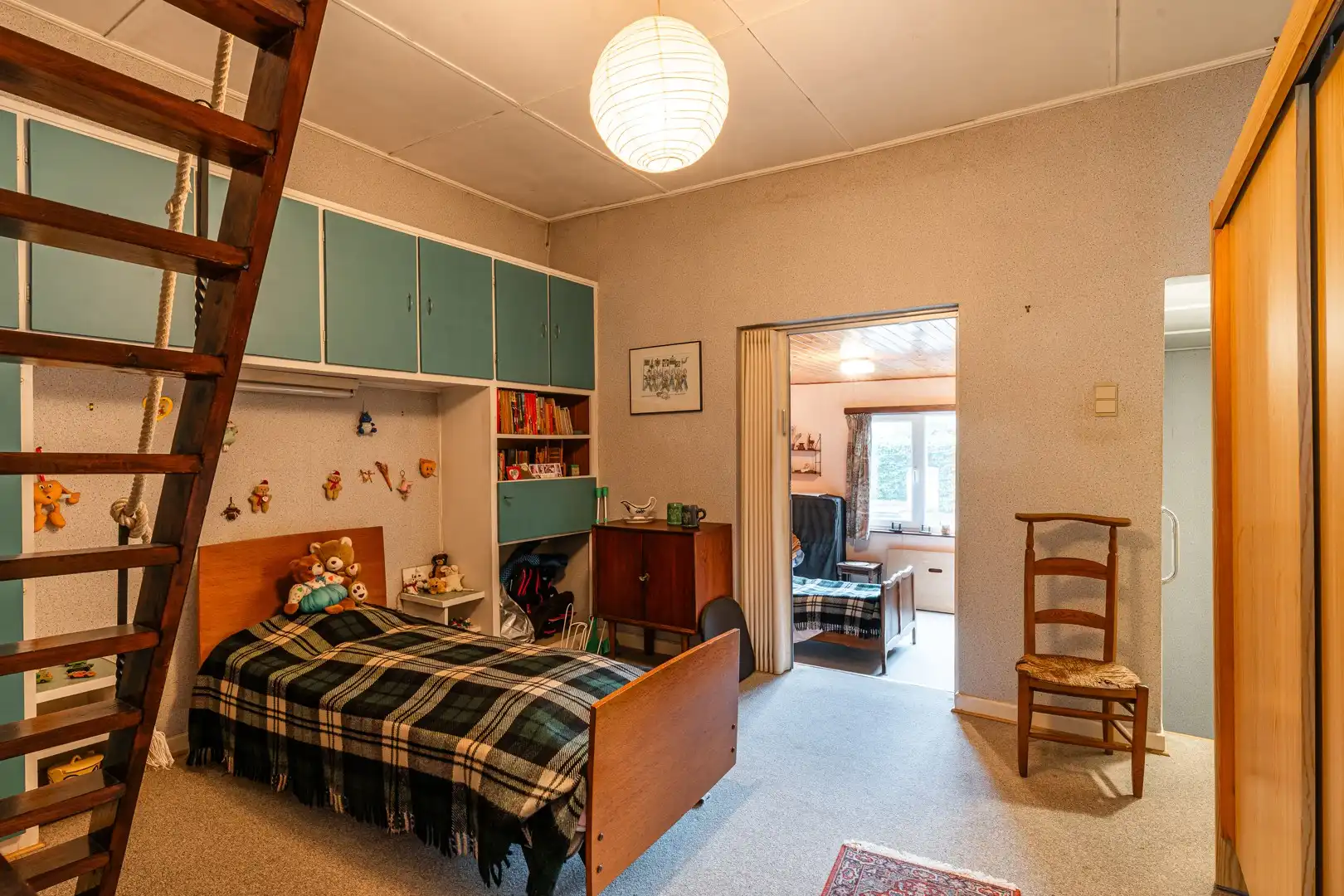 Te renoveren woning met verrassend veel ruimte, stadstuin en garagebox in Eeklo! foto 10