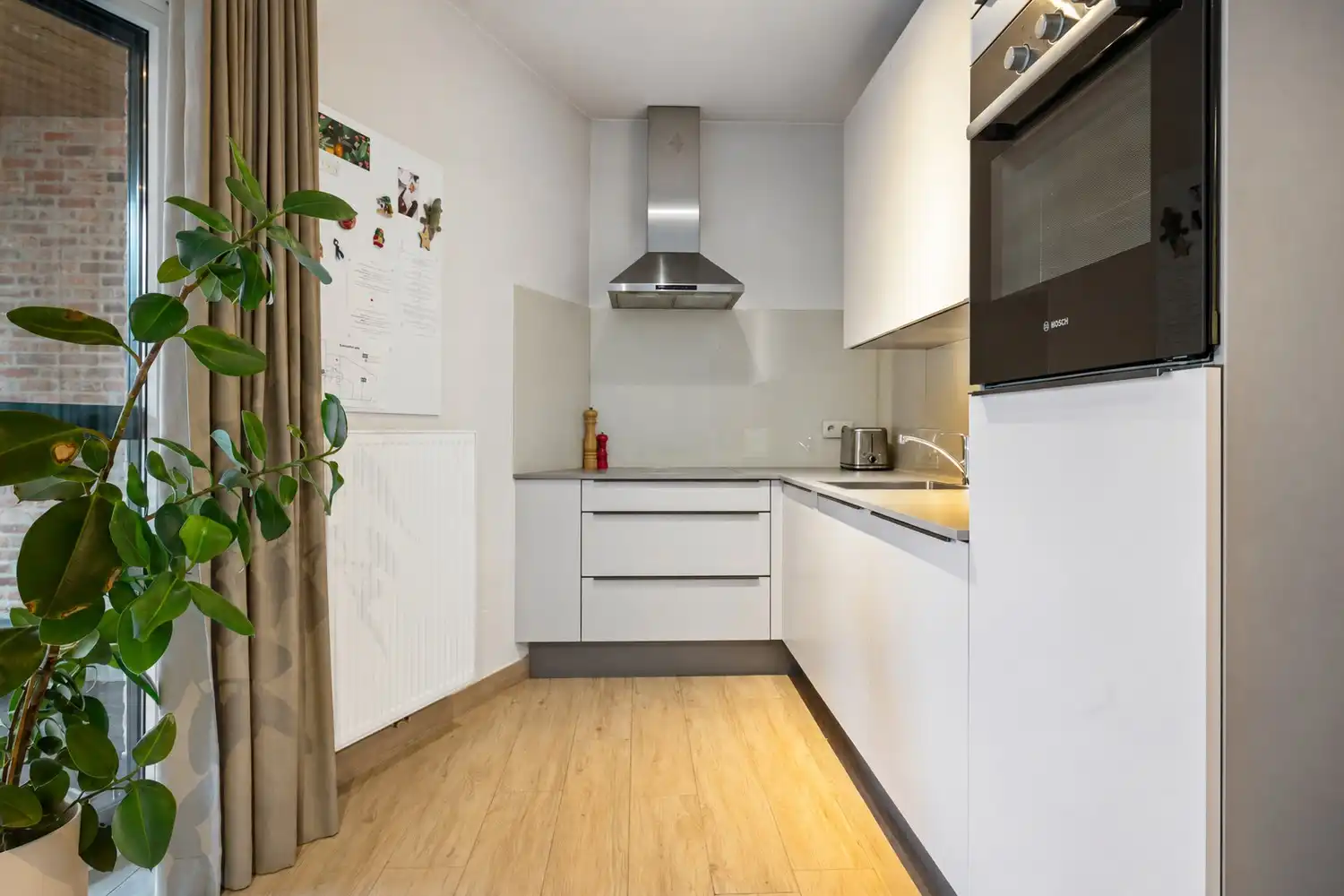 Recent gelijkvloers appartement met 2 slpkrs en stadstuintje te Mechelen foto 4