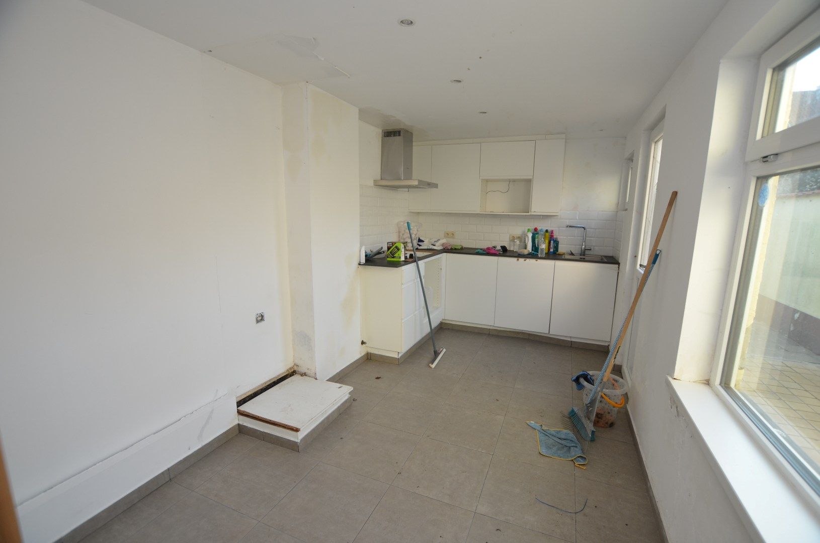 Gedeeltelijk gerenoveerd woonhuis foto 7