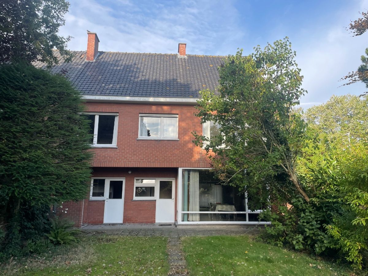 4-slpk EENGEZINSWONING + tuin foto 2