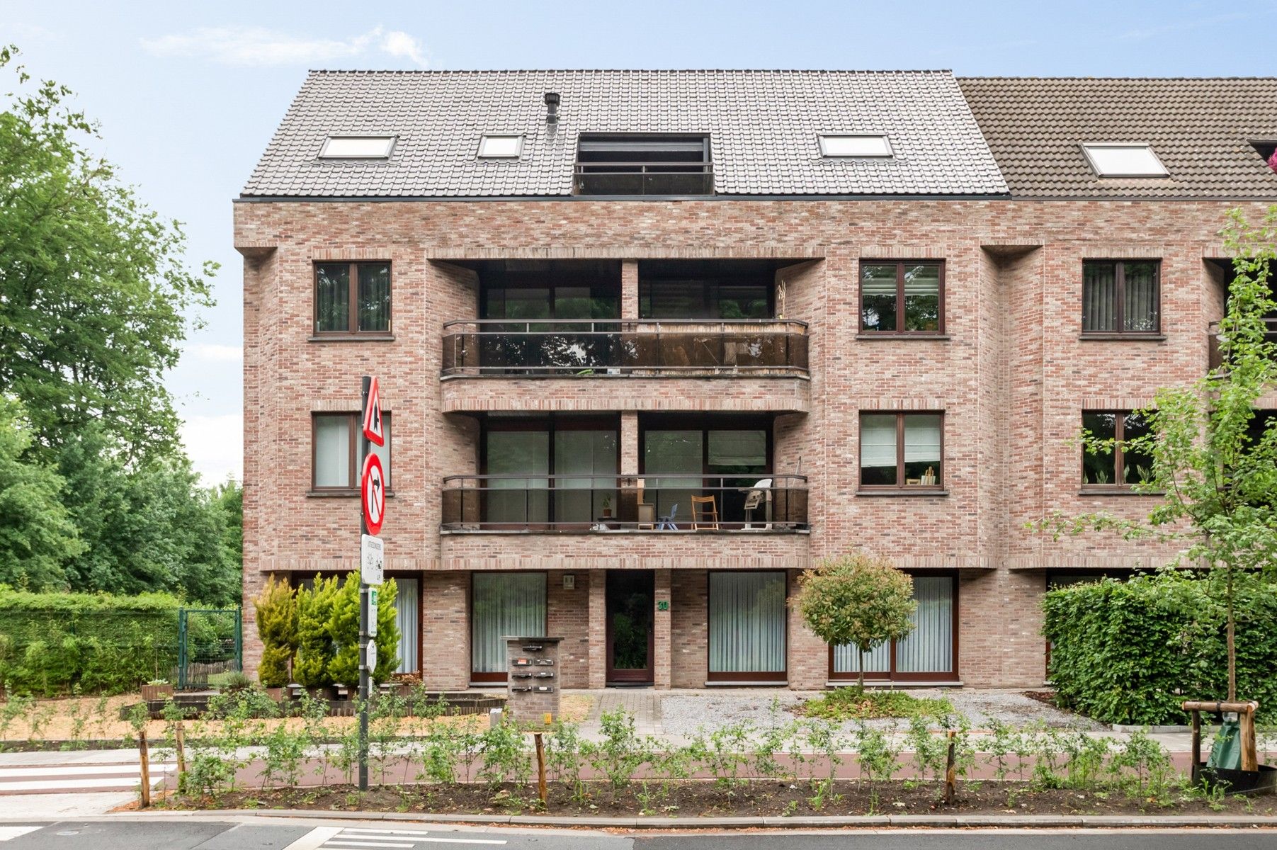 Gelijkvloers appartement met tuin en garage foto 17