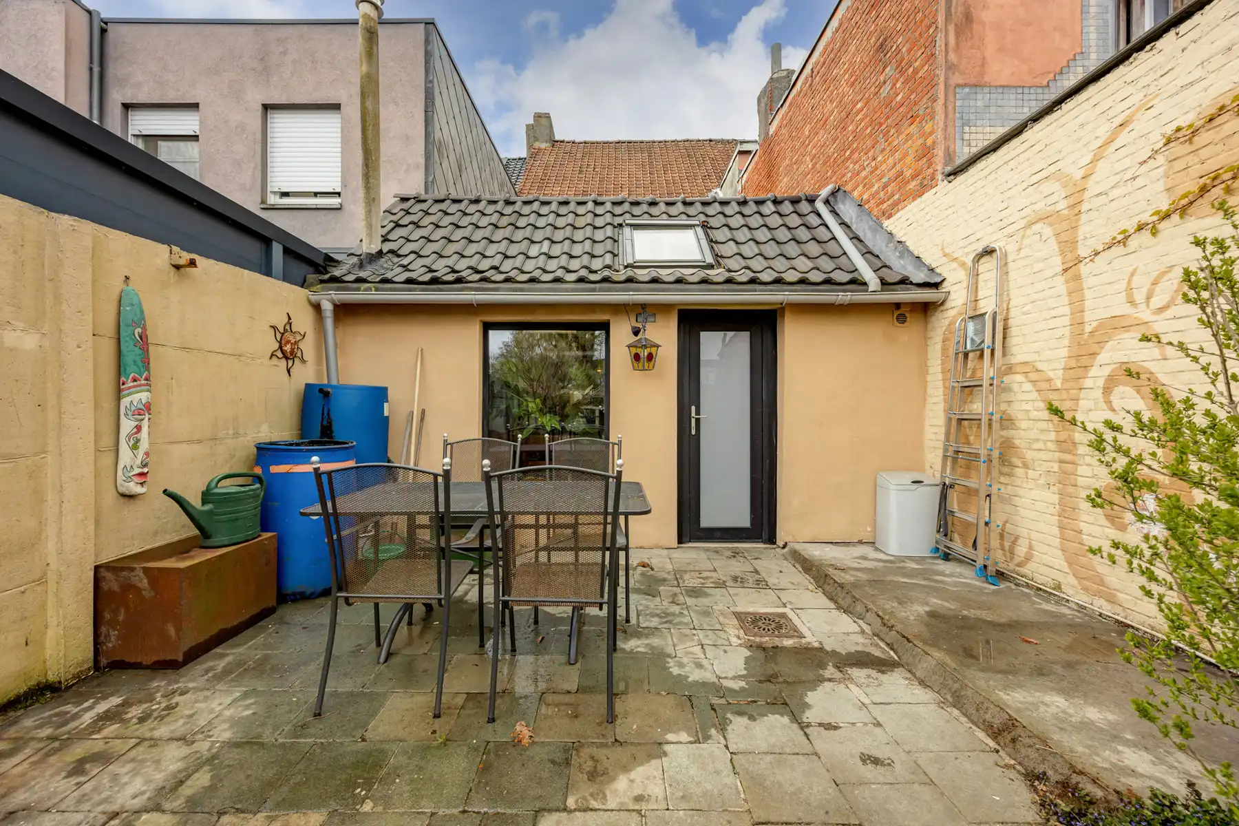 Stadswoning op een perceel van 230 m² met toegang achteraan de tuin. foto 15