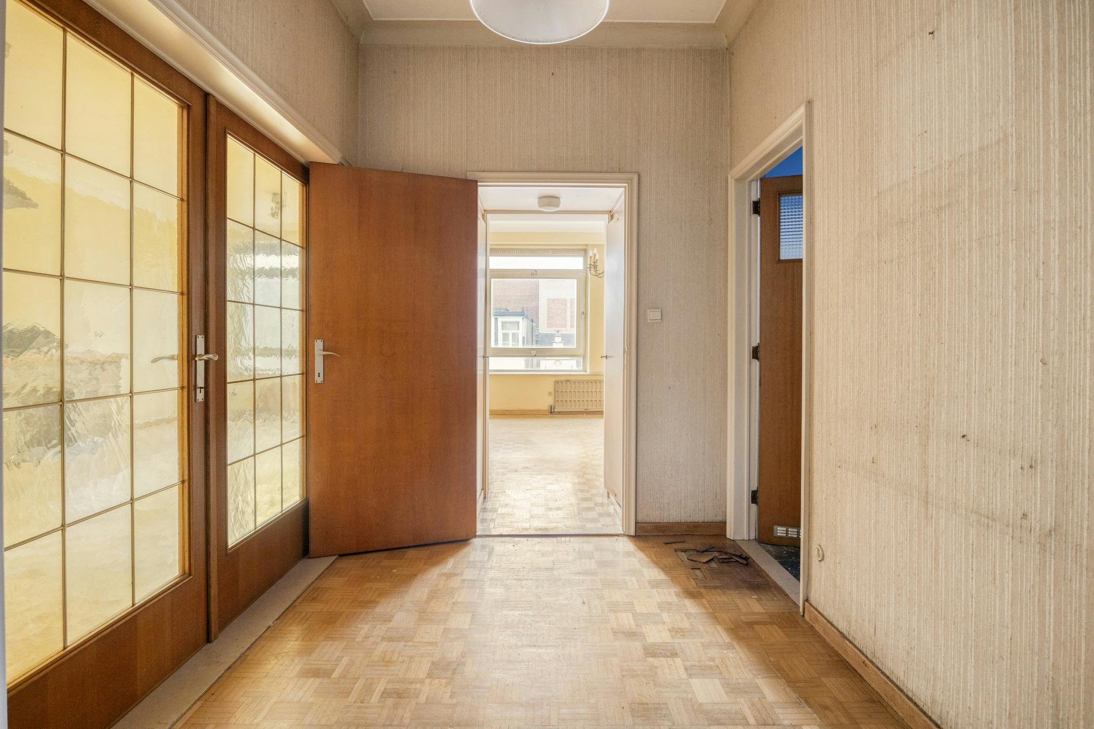 Te renoveren opbrengsteigendom met 3 appartementen en handelspand in Antwerpen foto 15