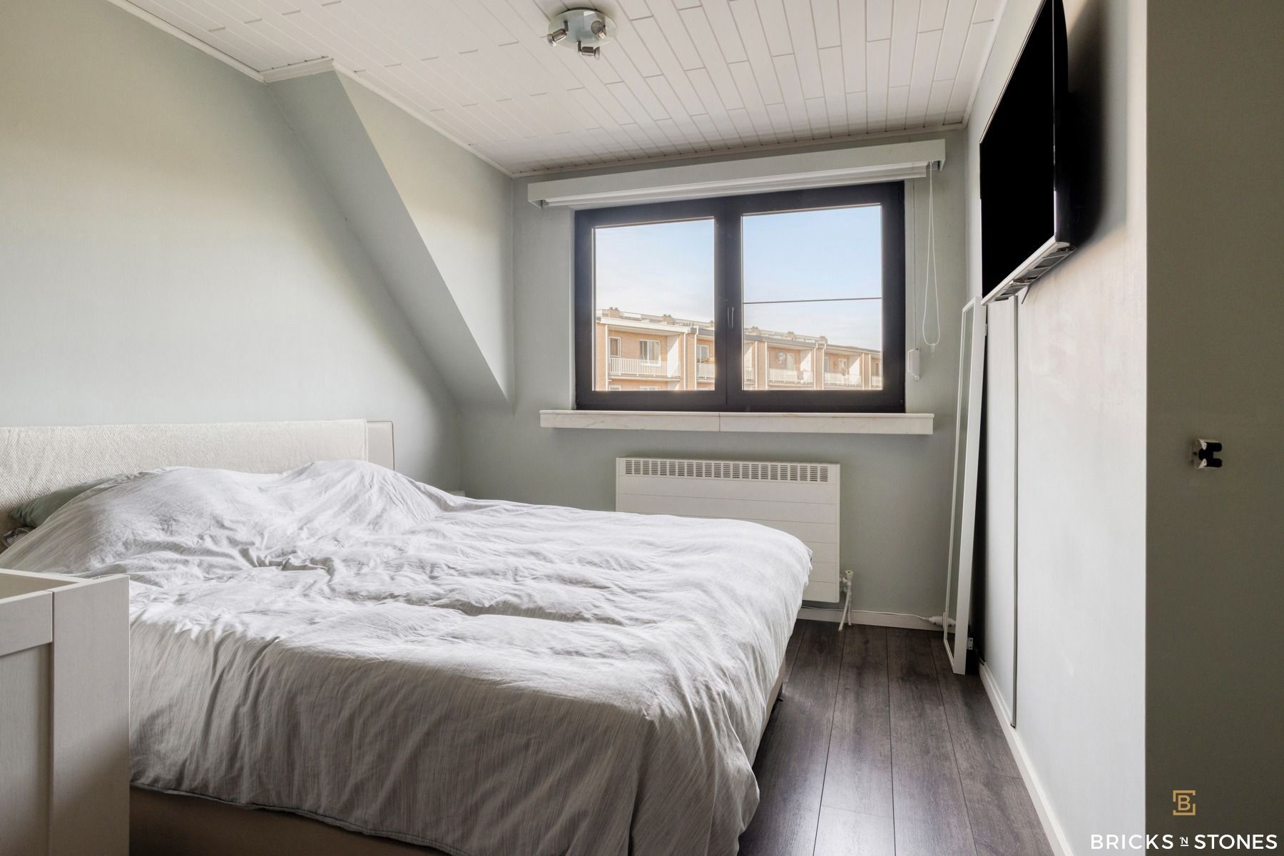 Knappe bel-etage woning met tuin foto 17