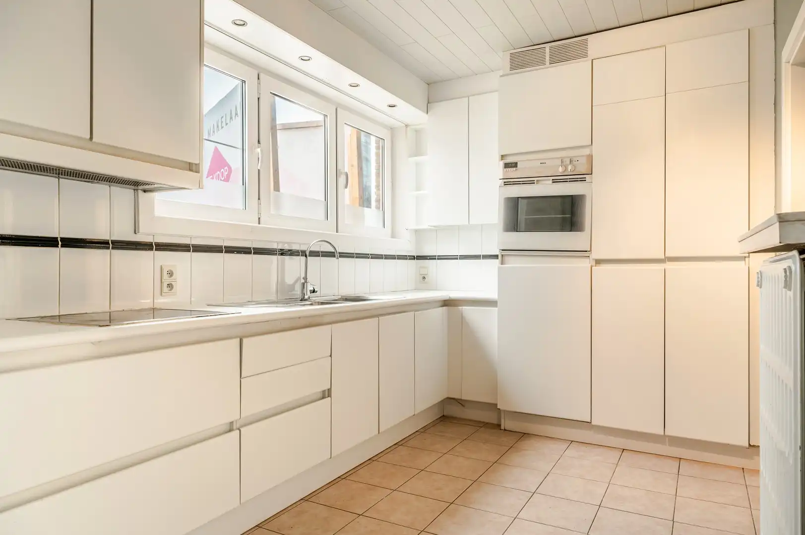 Op te frissen appartement op de eerste verdieping te Sint-Niklaas. foto 2