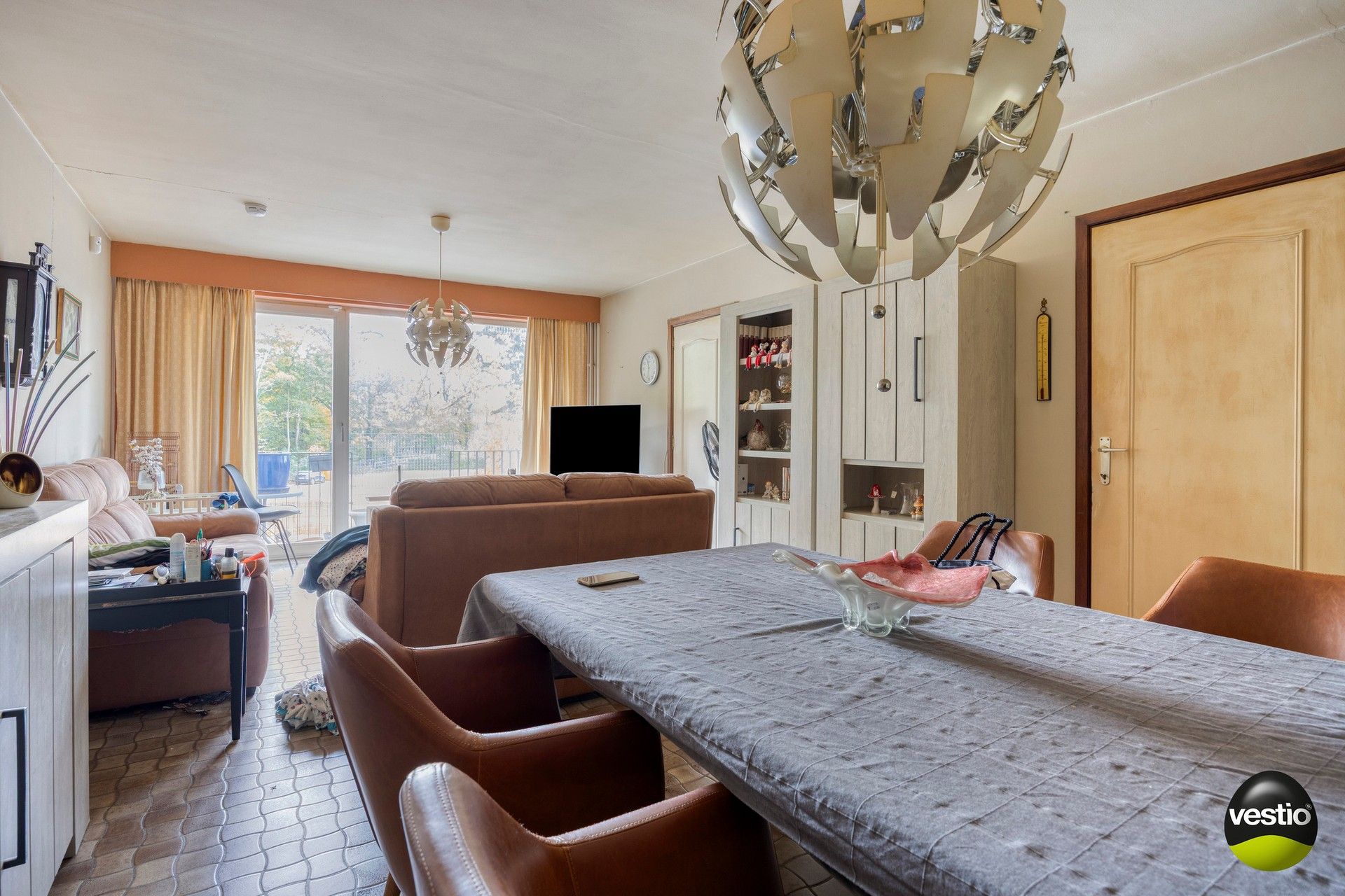 Te renoveren 2-slaapkamerappartement met terras, garagebox en kelder. foto 4