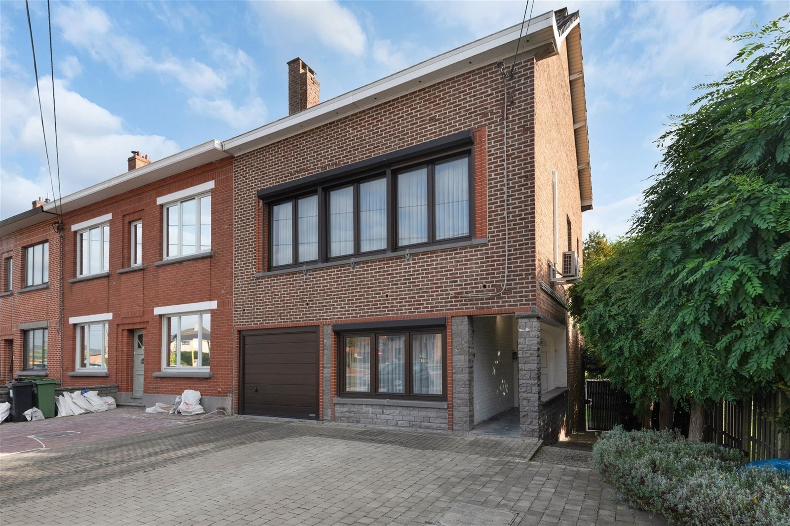 Hoofdfoto van de publicatie: gezinswoning met tuin en garage op 2are74