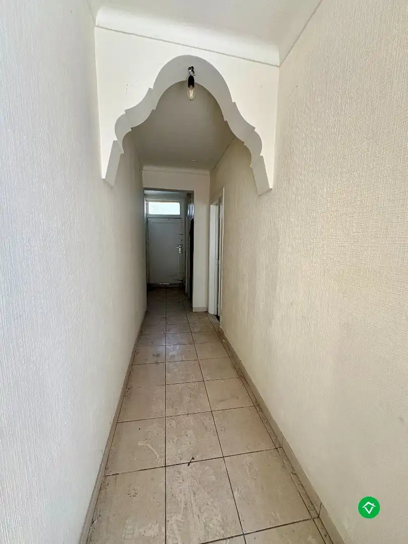 Woning met veel potentieel op een ruim perceel in het centrum van Koekelare foto 12