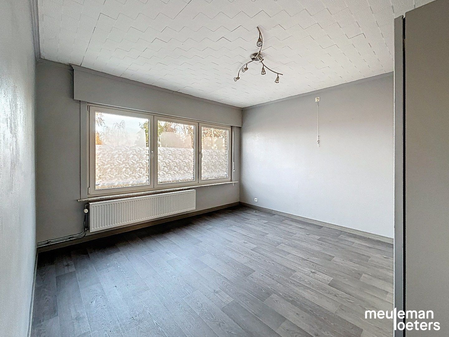 Halfopen gezinswoning met garage en tuin foto 7