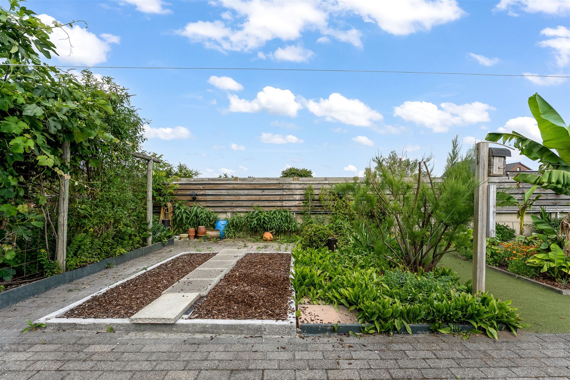 PERFECT ONDERHOUDEN WONING MET RUIME GARAGE EN BIJGEBOUW foto 26