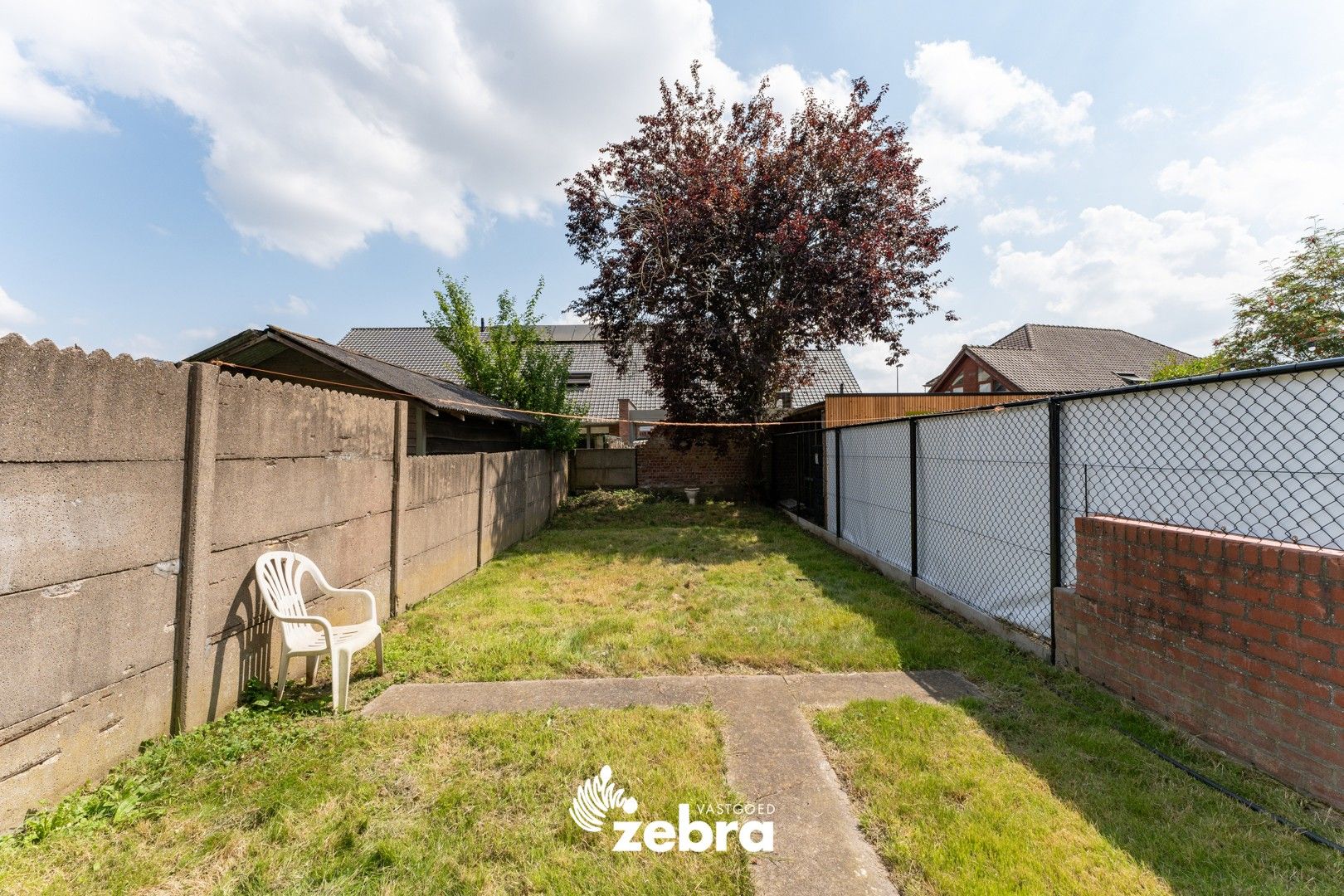 Gesloten bebouwing met zonneterras en tuin, vlakbij centrum Roeselare! foto 10