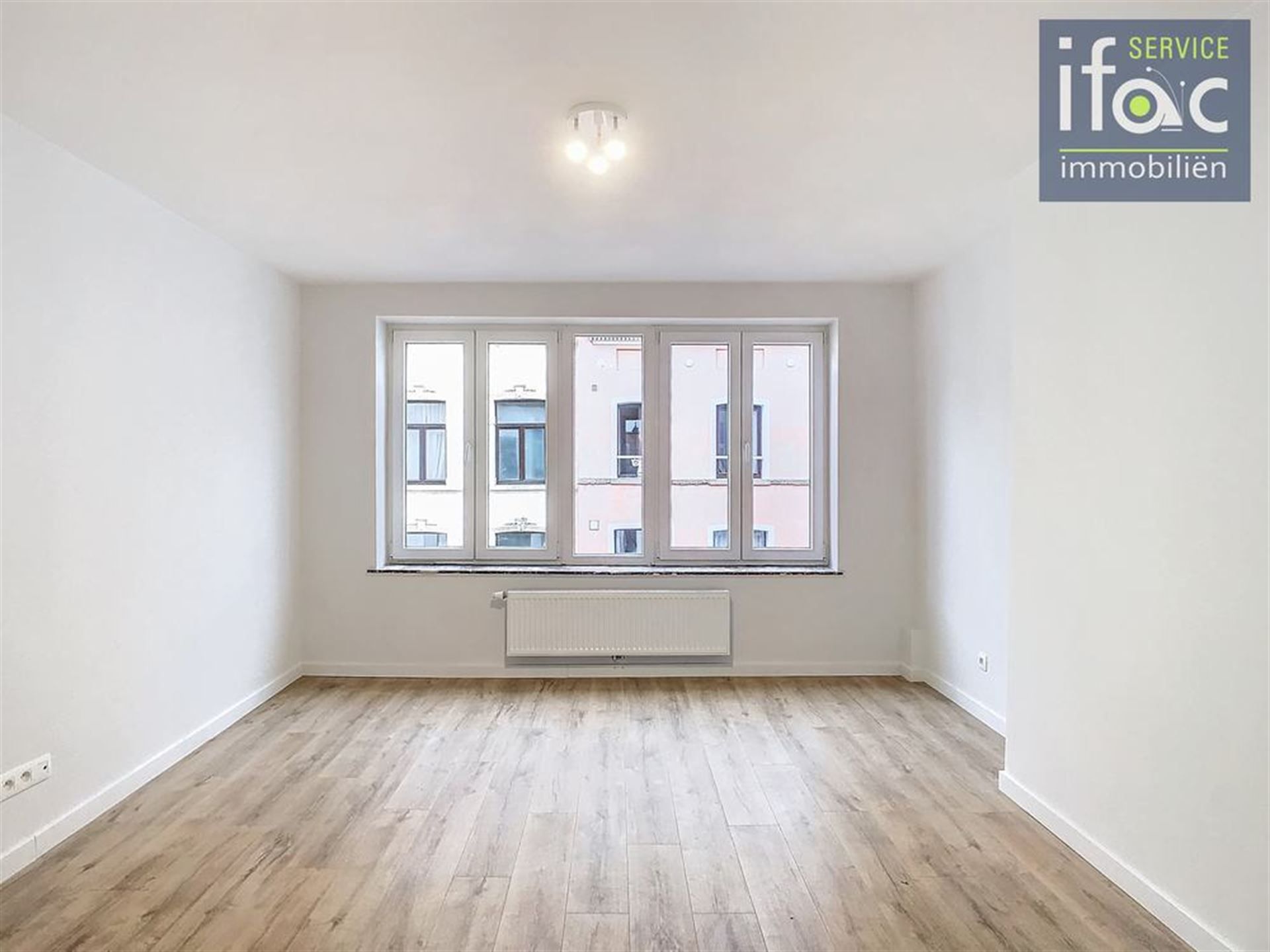 Aangename en volledig gerenoveerde duplex foto 3