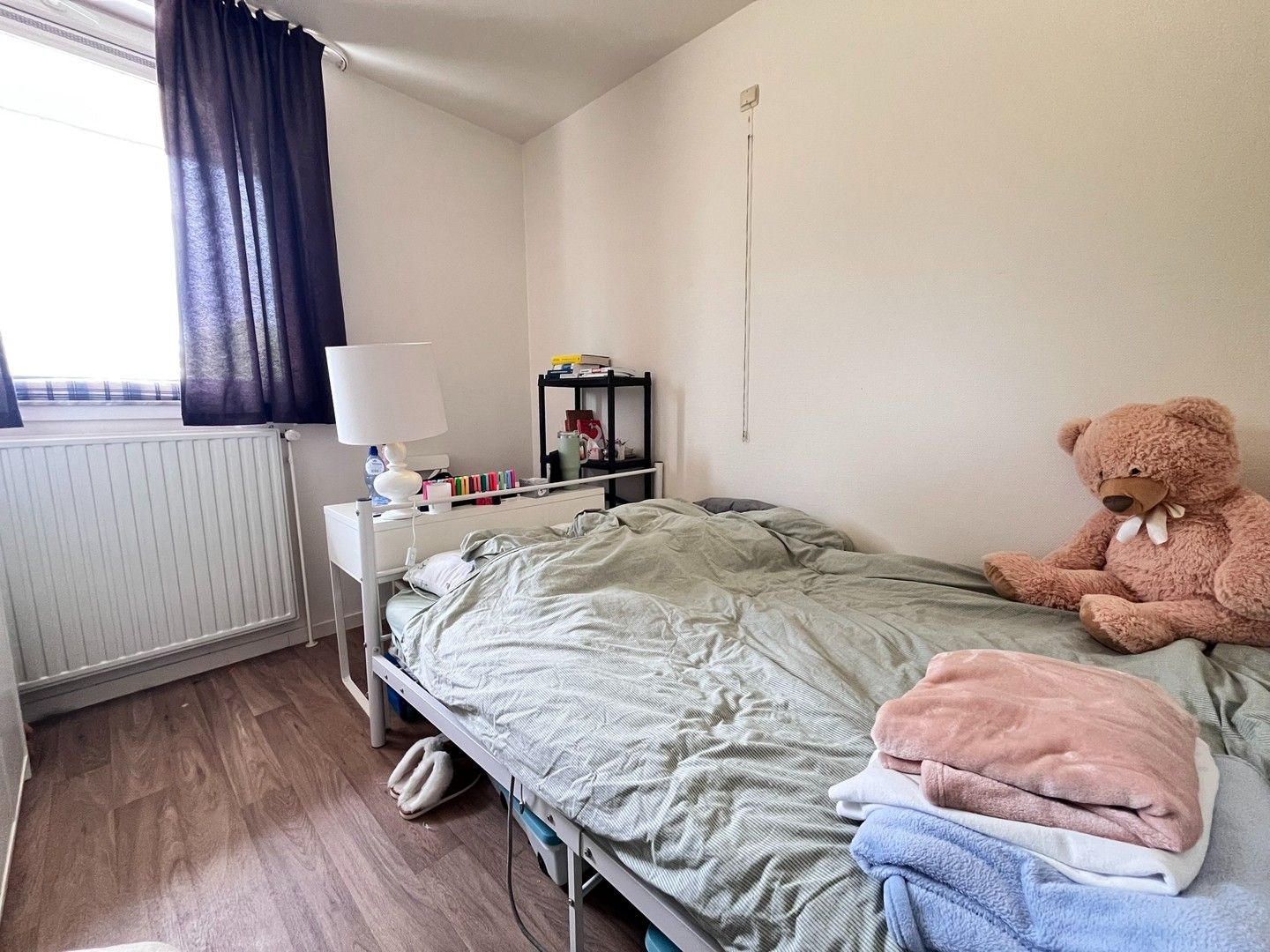 Gelijkvloers appartement met 2 slaapkamers, kelderberging en garage foto 12