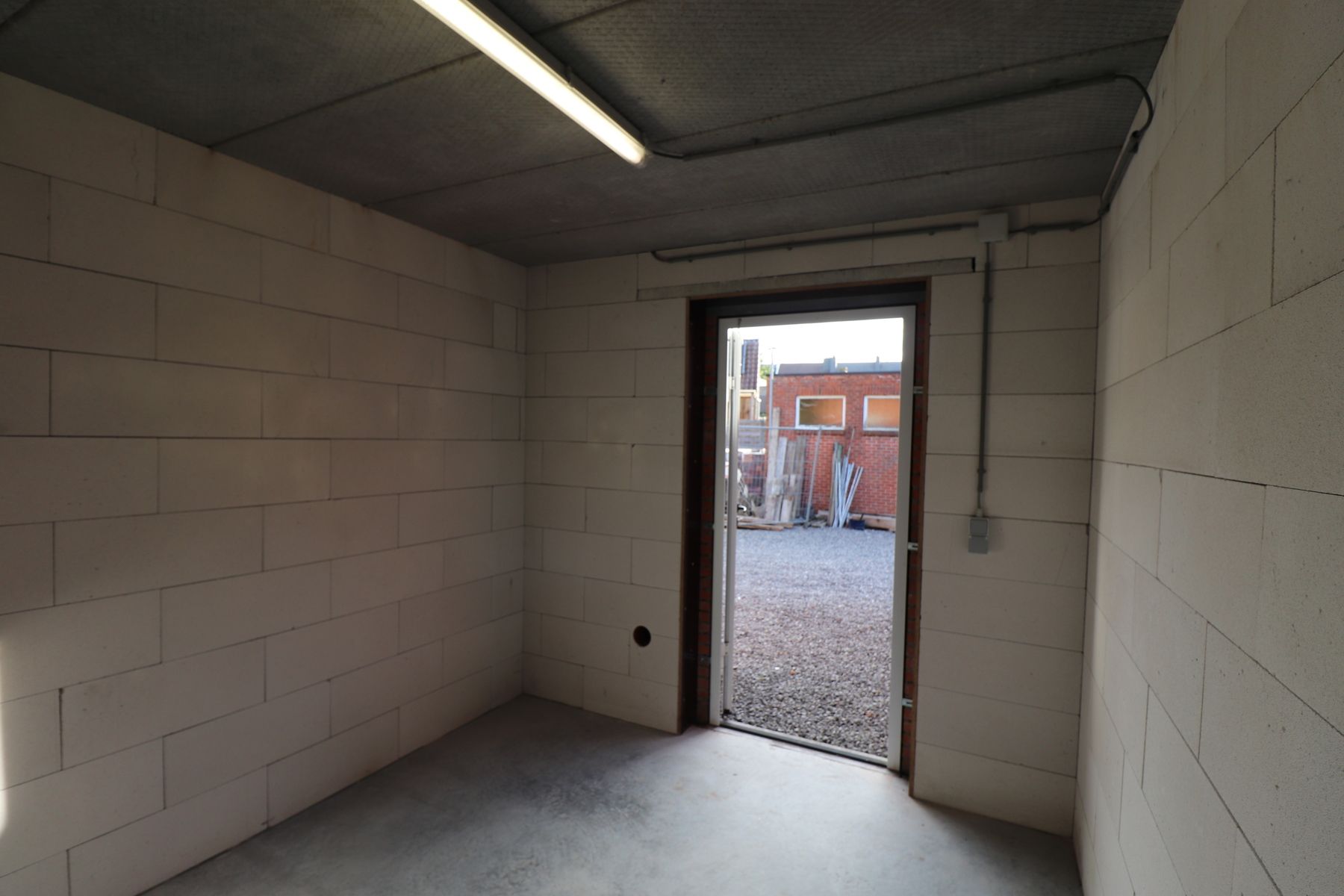 Een berging van ca. 9m² in het centrum van Merksplas. foto 2