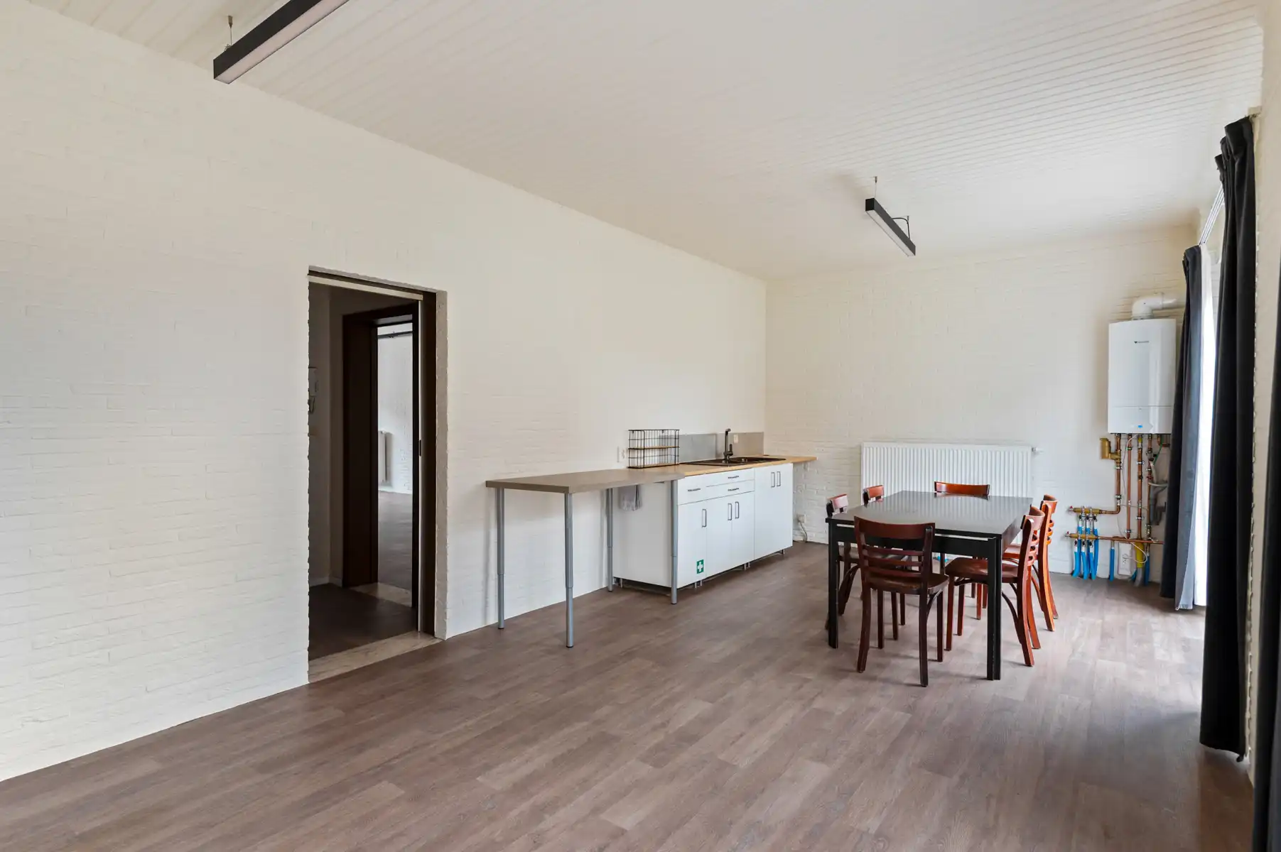 Gelijkvloers handelsruimte met koer én woonst op verdieping foto 11