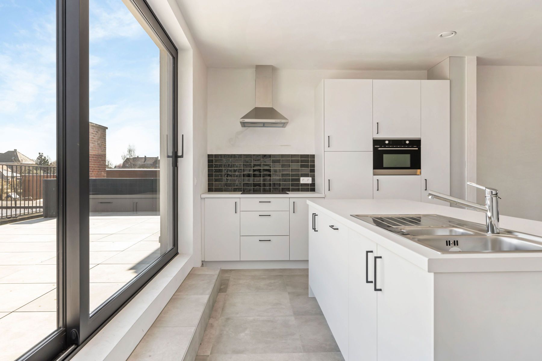 Nieuwbouwappartement met zéér ruim terras en groen zicht foto 2