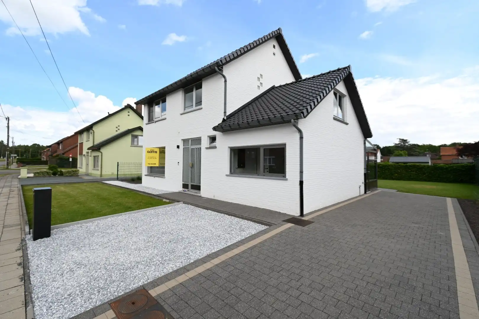Zorgvuldig gerenoveerde vrijstaande woning met veranda en leuke tuin op 5a24ca te Munsterbilzen foto 2