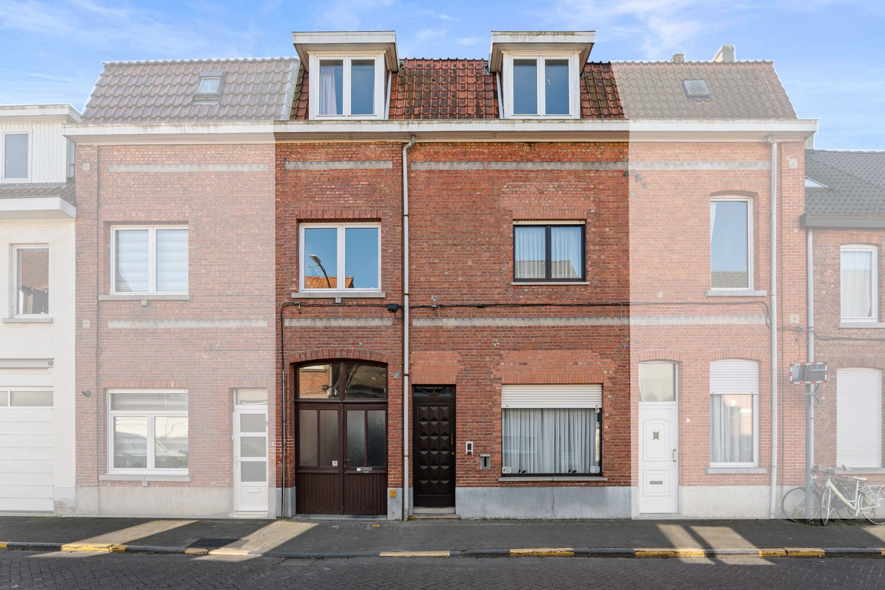 Hoofdfoto van de publicatie: Investeringspand: appartement en woning in centrum Zele