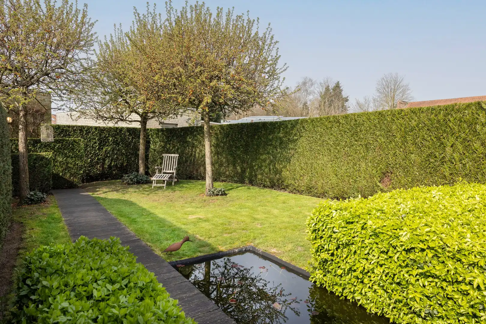 Gezellige stadswoning met zongerichte tuin, garage & parking. foto 15