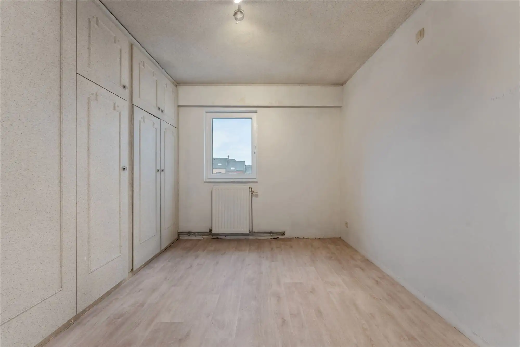 VERNIEUWD APPARTEMENT MET 2 SLAAPKAMERS PAL IN HET CENTRUM VAN BERINGEN foto 18