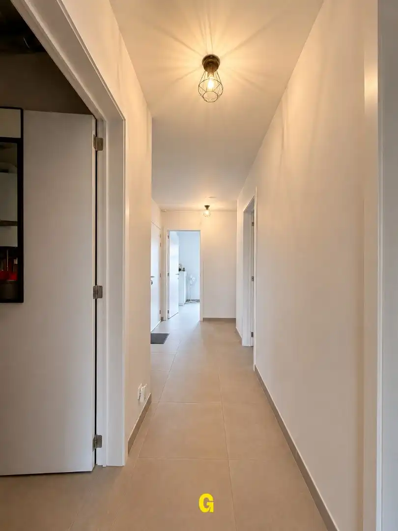 Knap afgewerkt gelijkvloersappartement met 2 slaapkamers, ruim terras en tuintje met tuinberging foto 11