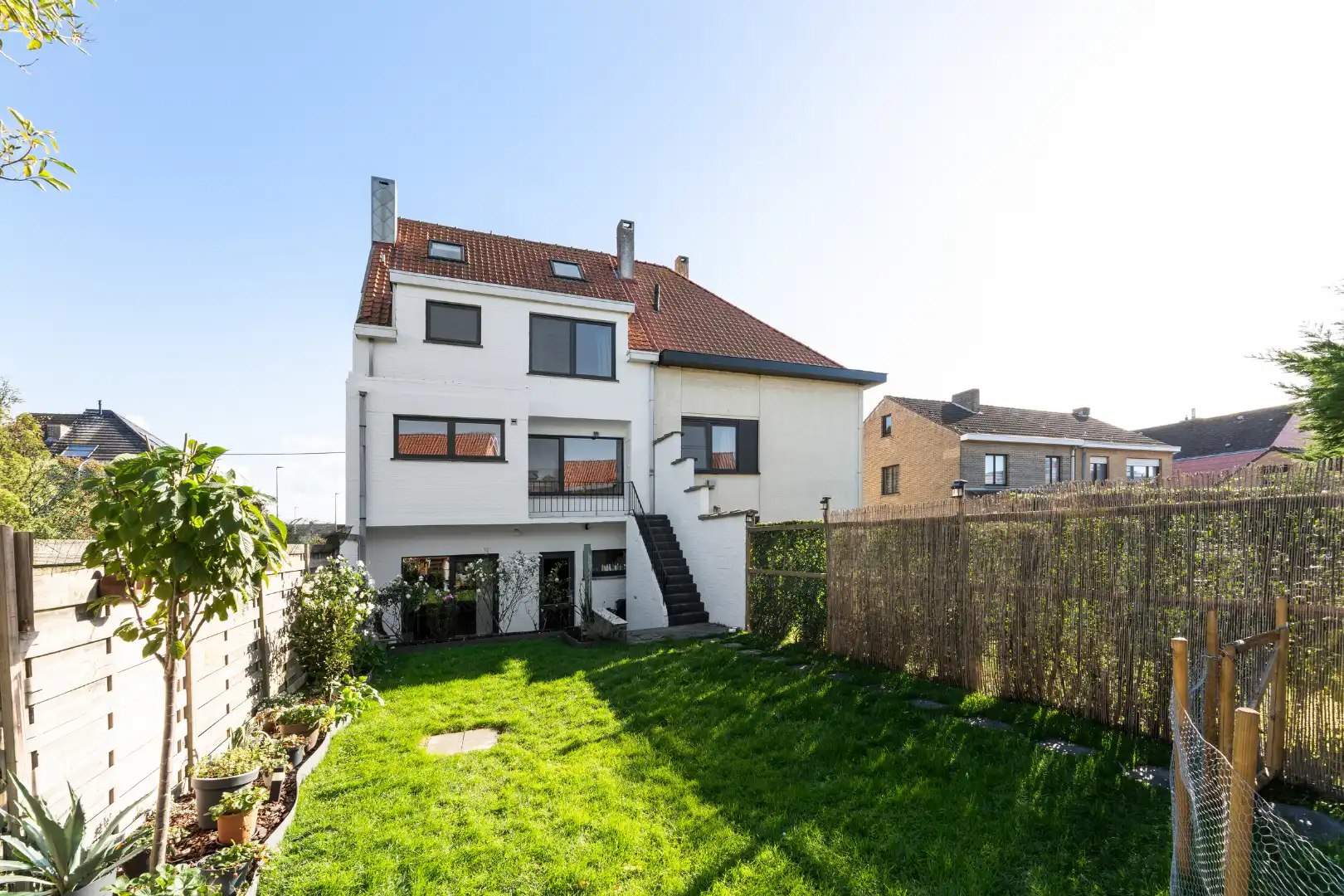Lichtrijke bel-etage met 4 slaapkamers, garage en zonnige leefruimtes in het gegeerde Mariakerke foto 25