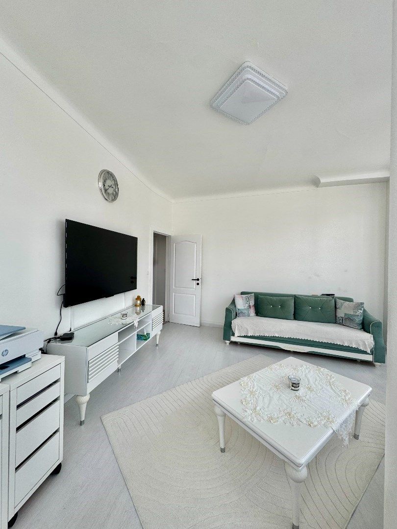 Licht en ruim 2-slaapkamerappartement te koop in Laken foto 4