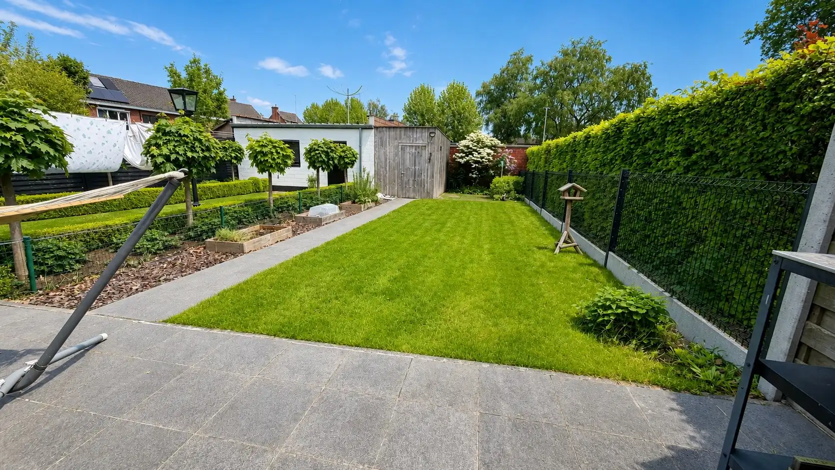 Rustig en centraal gelegen instapklare gezinswoning met zonnige tuin en garage foto 18