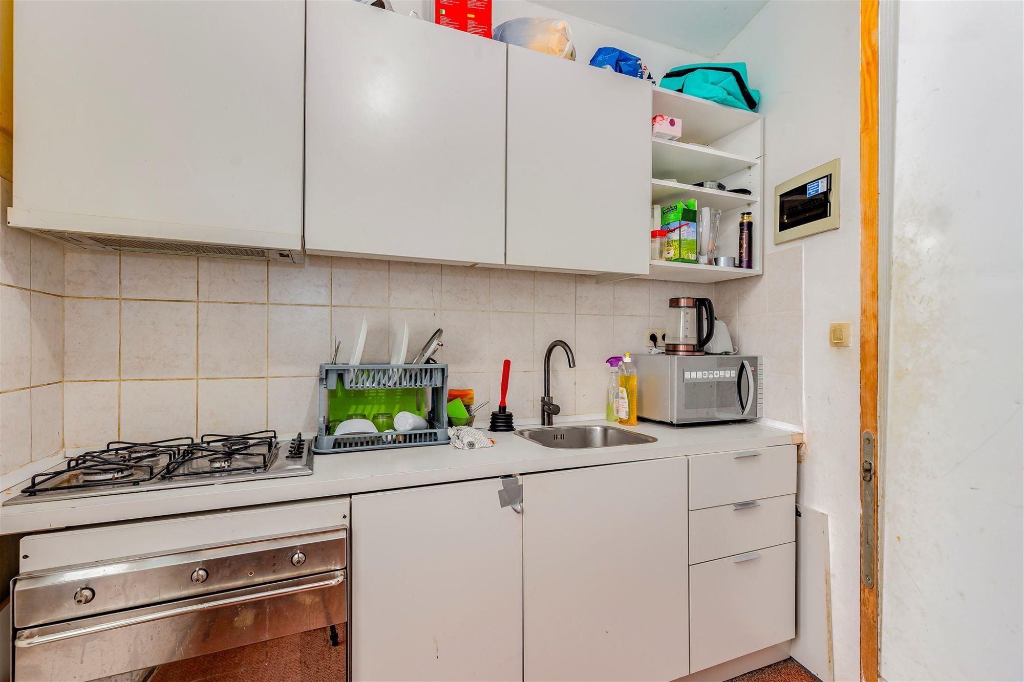 Hoekpand bestaande uit handelsglvl + 6 appartementen foto 23
