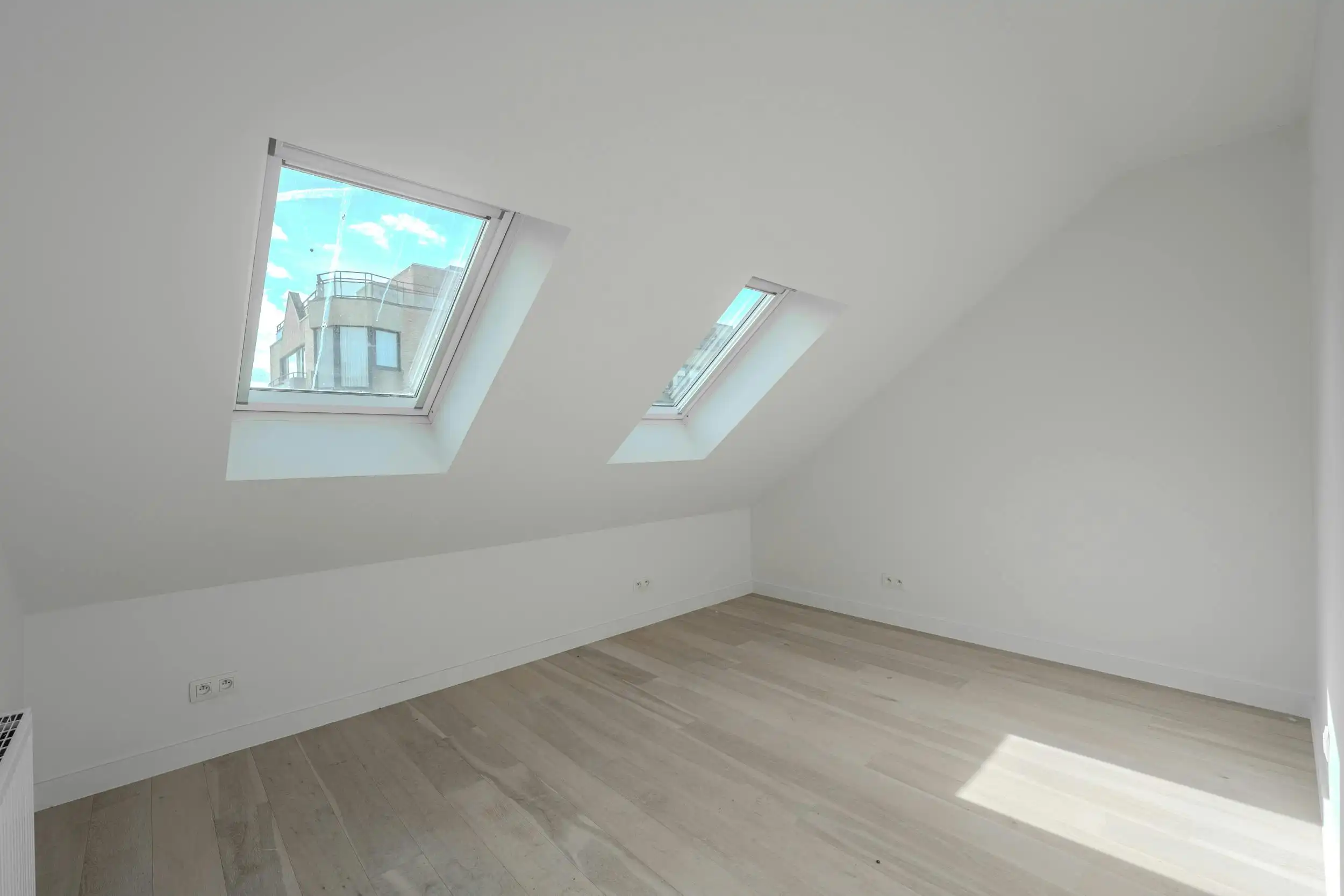 Magnifiek gerenoveerd duplexappartement te Oostende foto 14