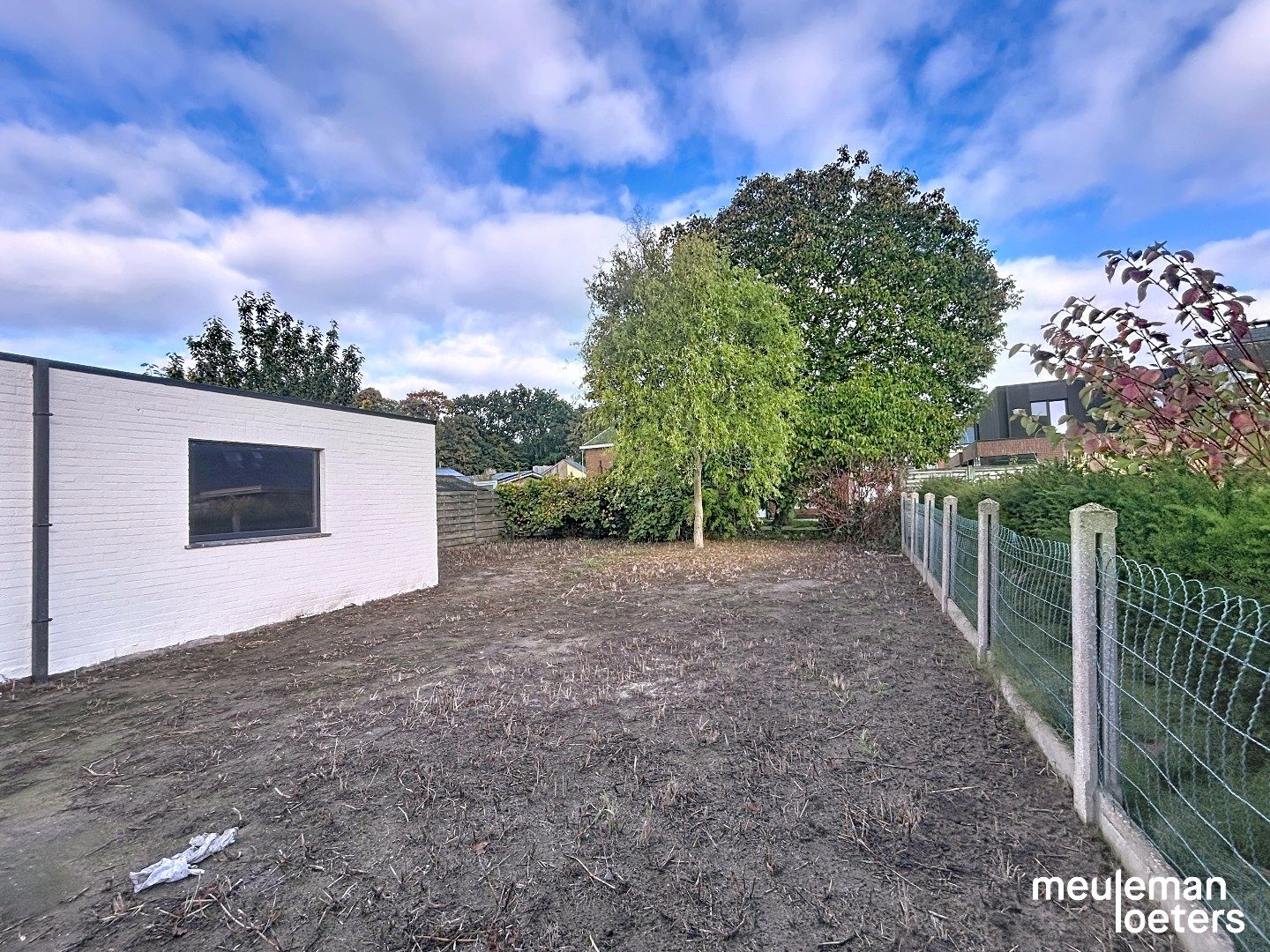 Instapklare woning met tuin en ruime garage foto 15