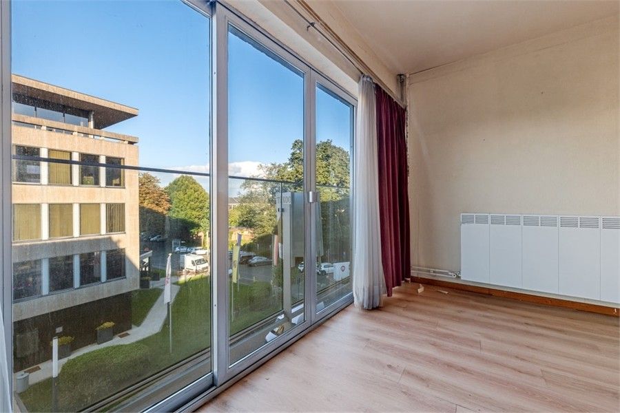 OP TE FRISSEN APPARTEMENT IN HET CENTRUM VAN SINT-TRUIDEN foto 10