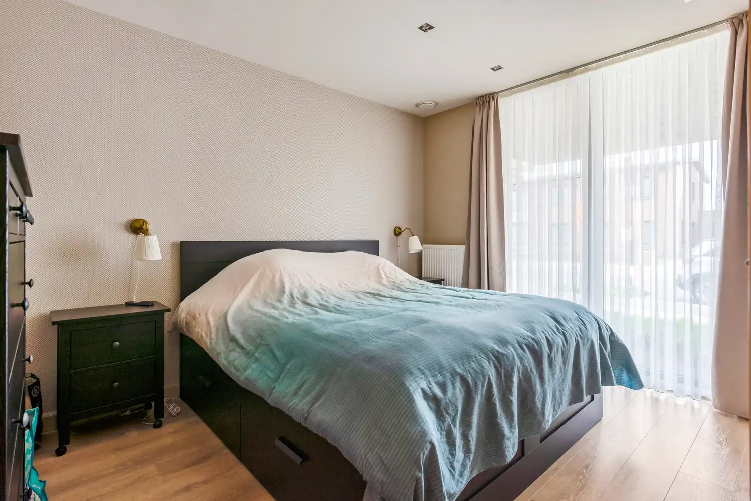 Instapklaar, recent gelijkvloers appartement met 2 slpks en tuin in Borsbeek! foto 9