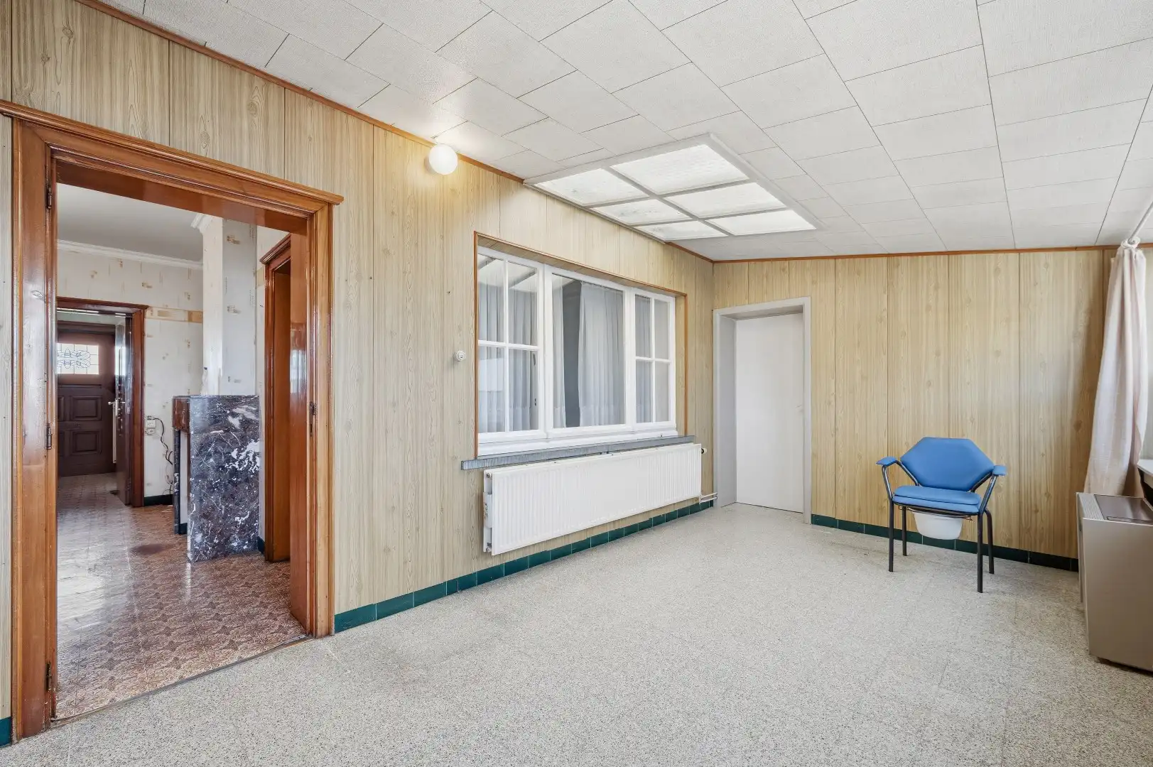 Te renoveren half open bebouwing met een ruime tuin en een prachtig zicht op de velden foto 11