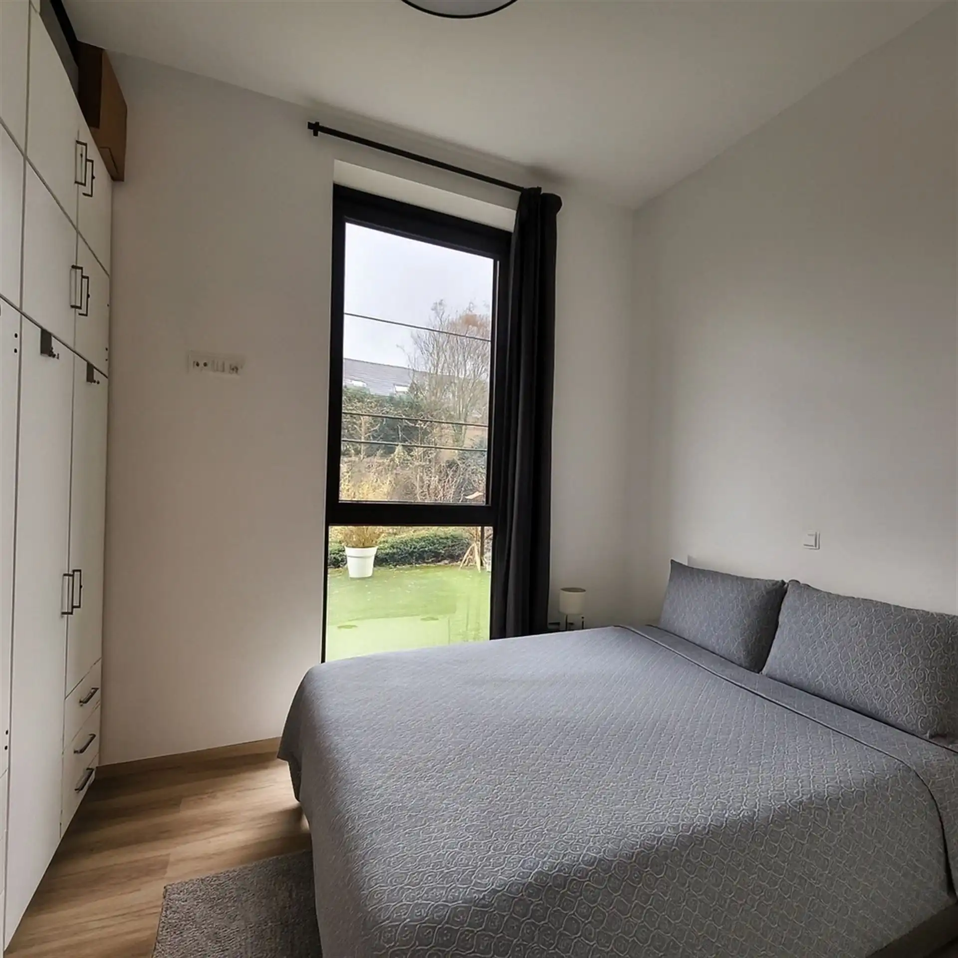 Gelijkvloers appartement met tuin! foto 6