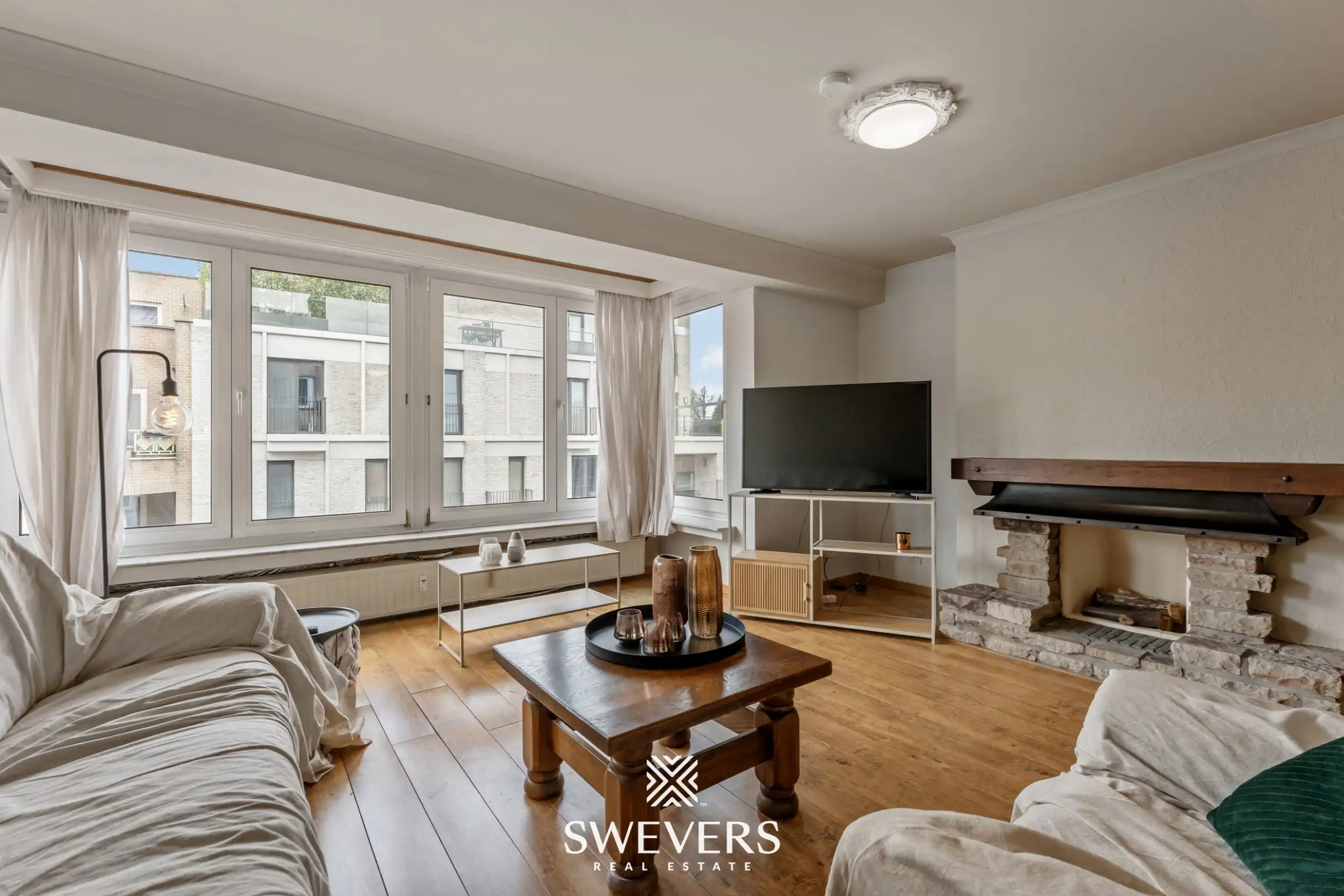 Ruim en lichtrijk 3-slpk appartement met 2 terrasjes in hartje Genk foto 2