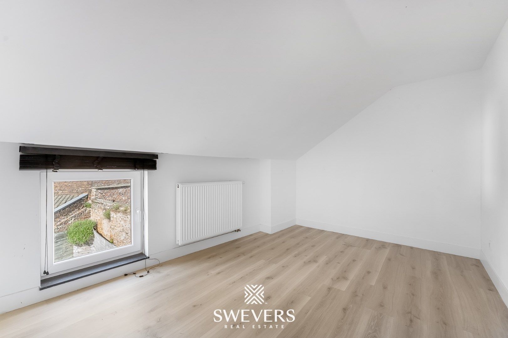 Ruim duplex appartement met knusse stadstuin in hartje Borgloon foto 20