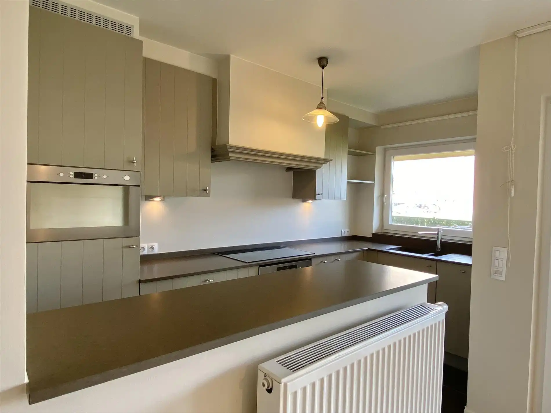 Ontdek dit prachtig gelijkvloers appartement met tuin en zicht op de Leie te Harelbeke! foto 5