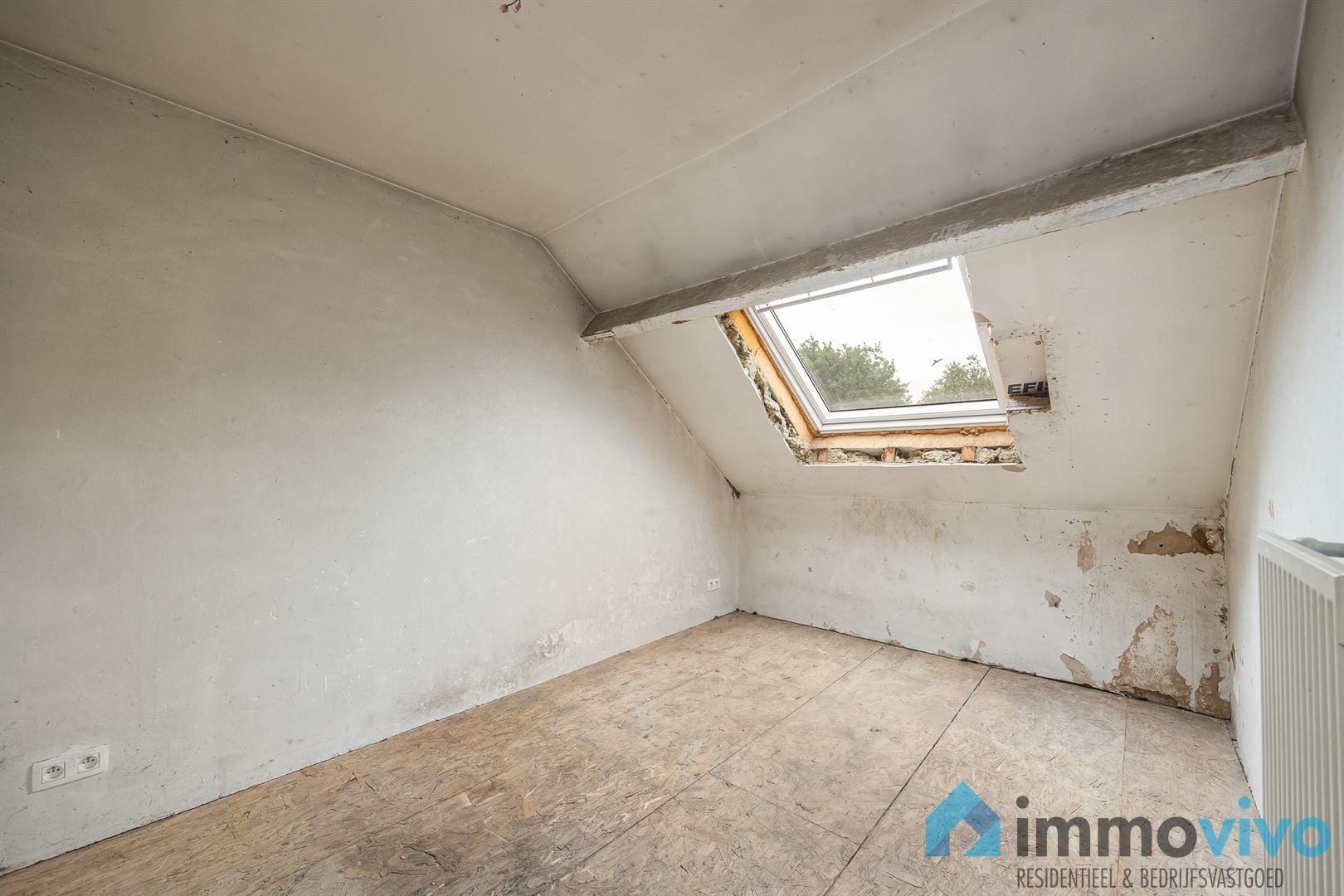 Te renoveren gezinswoning met 2/3 slaapkamers en zuidgerichte tuin. foto 10