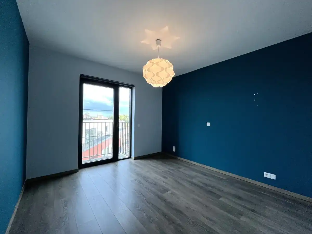 Te huur in Roeselare – Appartement met 2 slaapkamers en terras foto 9