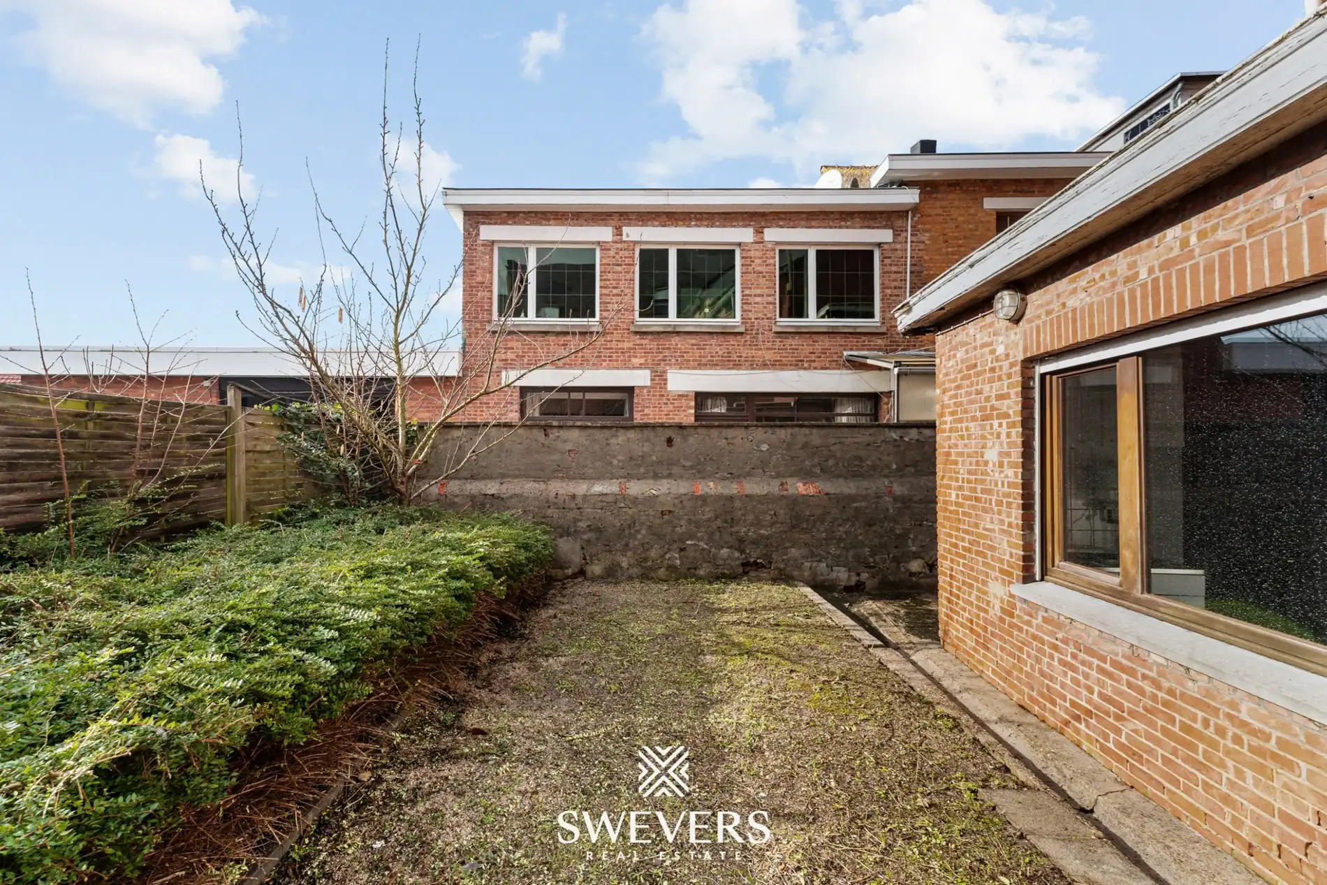 Authentiek pand (°1850) ruim duplex appartement met handelsruimte foto 30