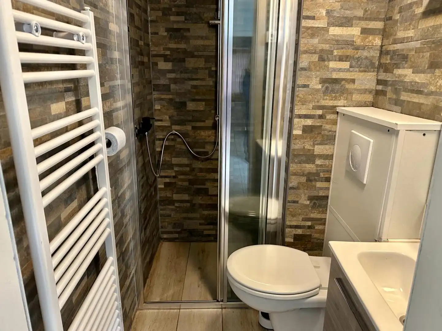 Te huur in Merchtem: compact 1-slpk-appartement met terras foto 5