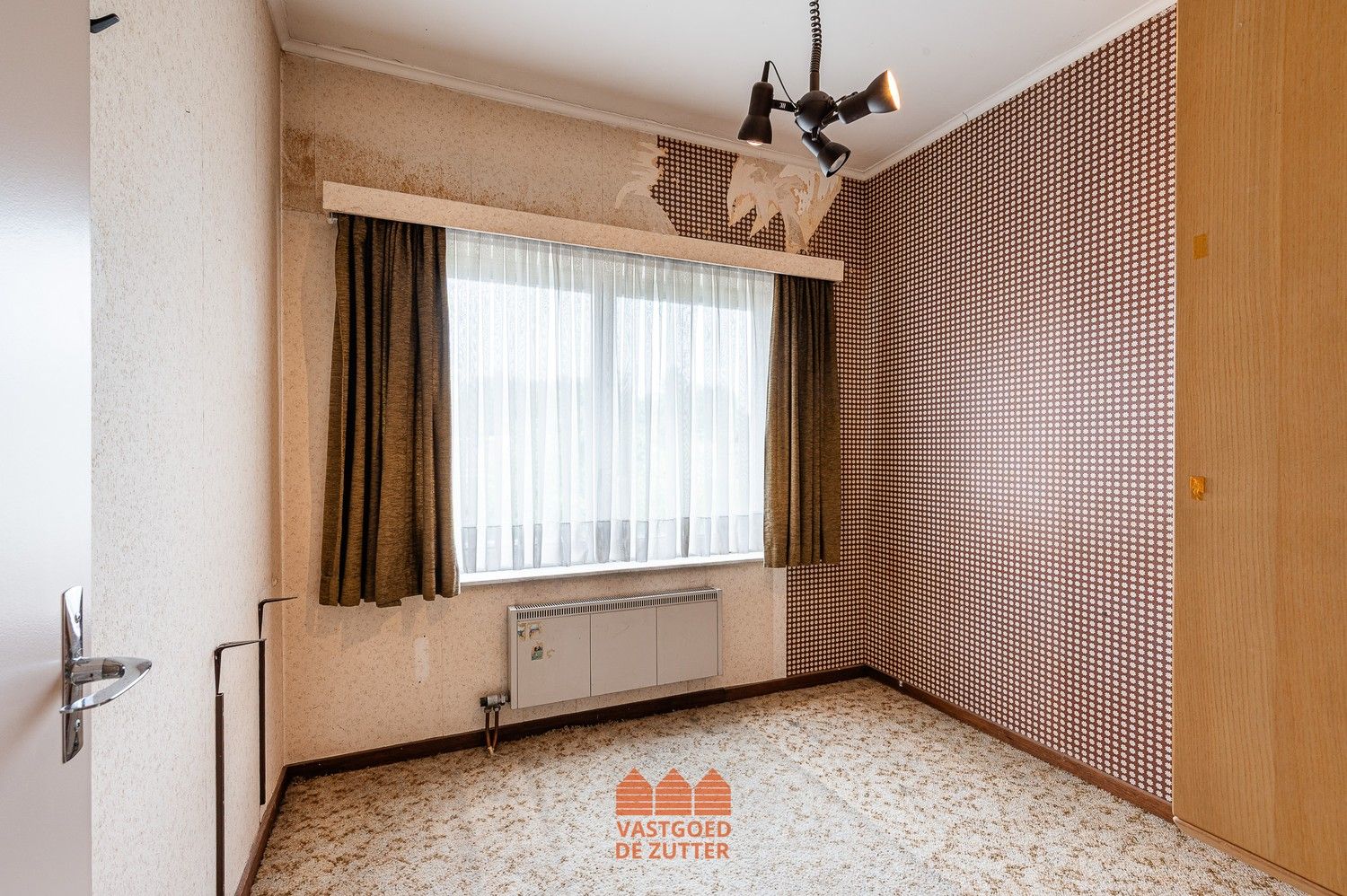 Lichtrijke halfopen bebouwing met 3 slaapkamers en garage foto 14