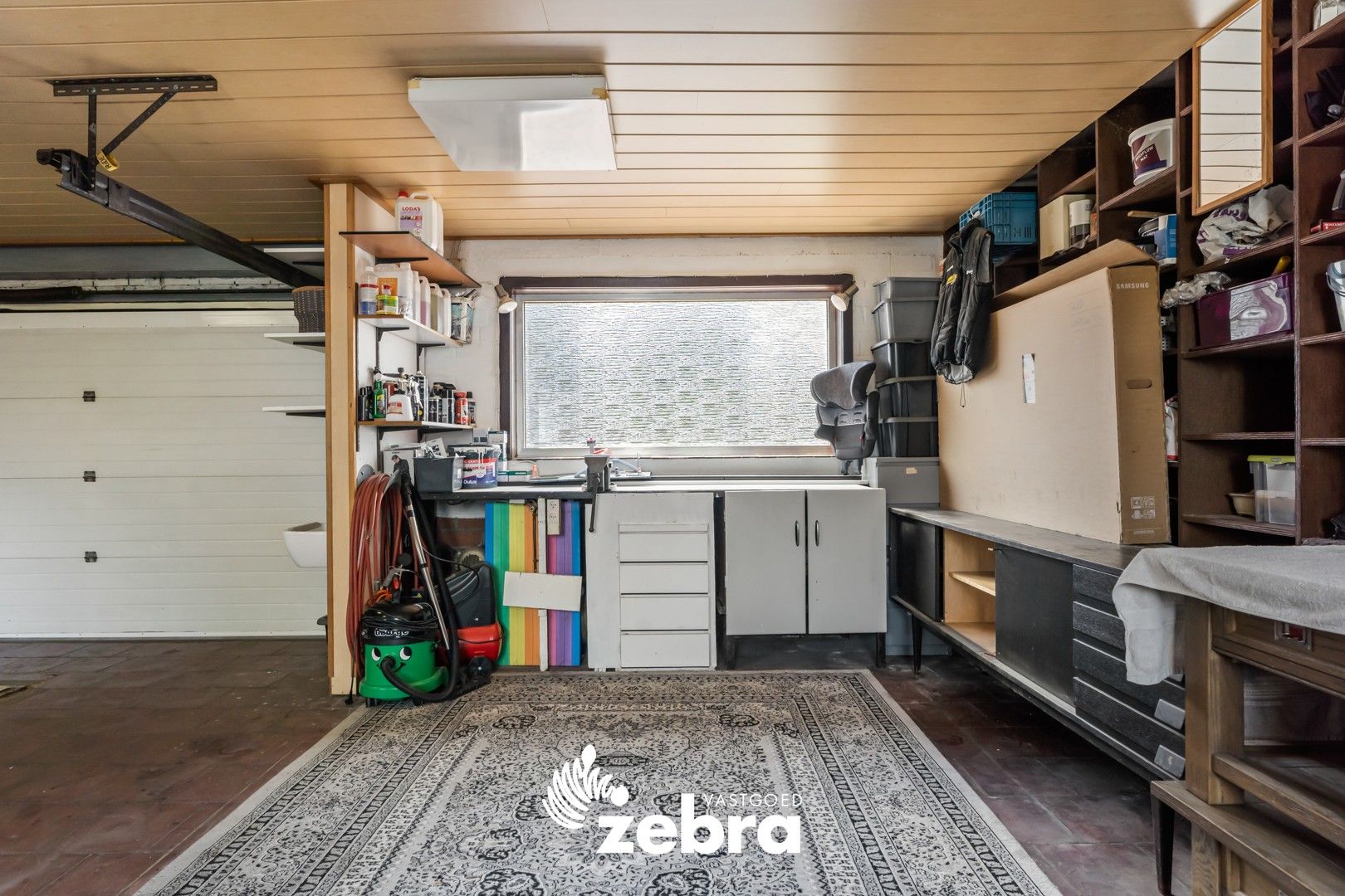 Instapklare woning met grote garage en 3 volwaardige slaapkamers! foto 10