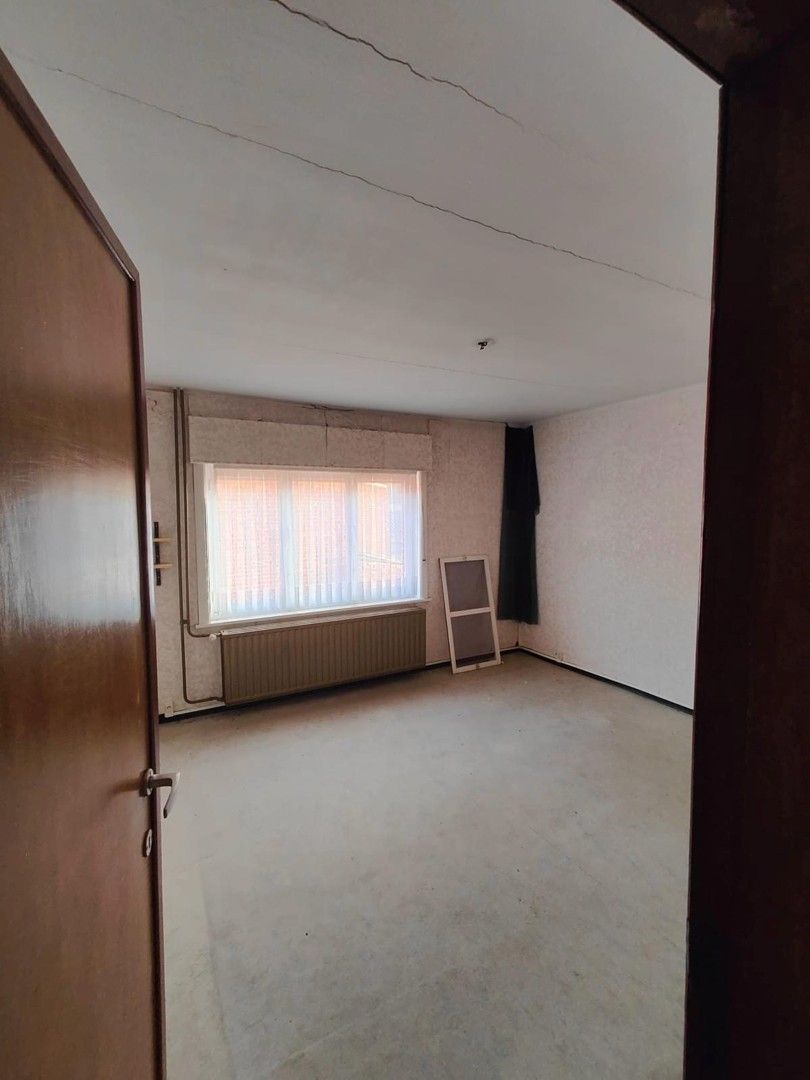 Woning met loods en voormalige showroom foto 15