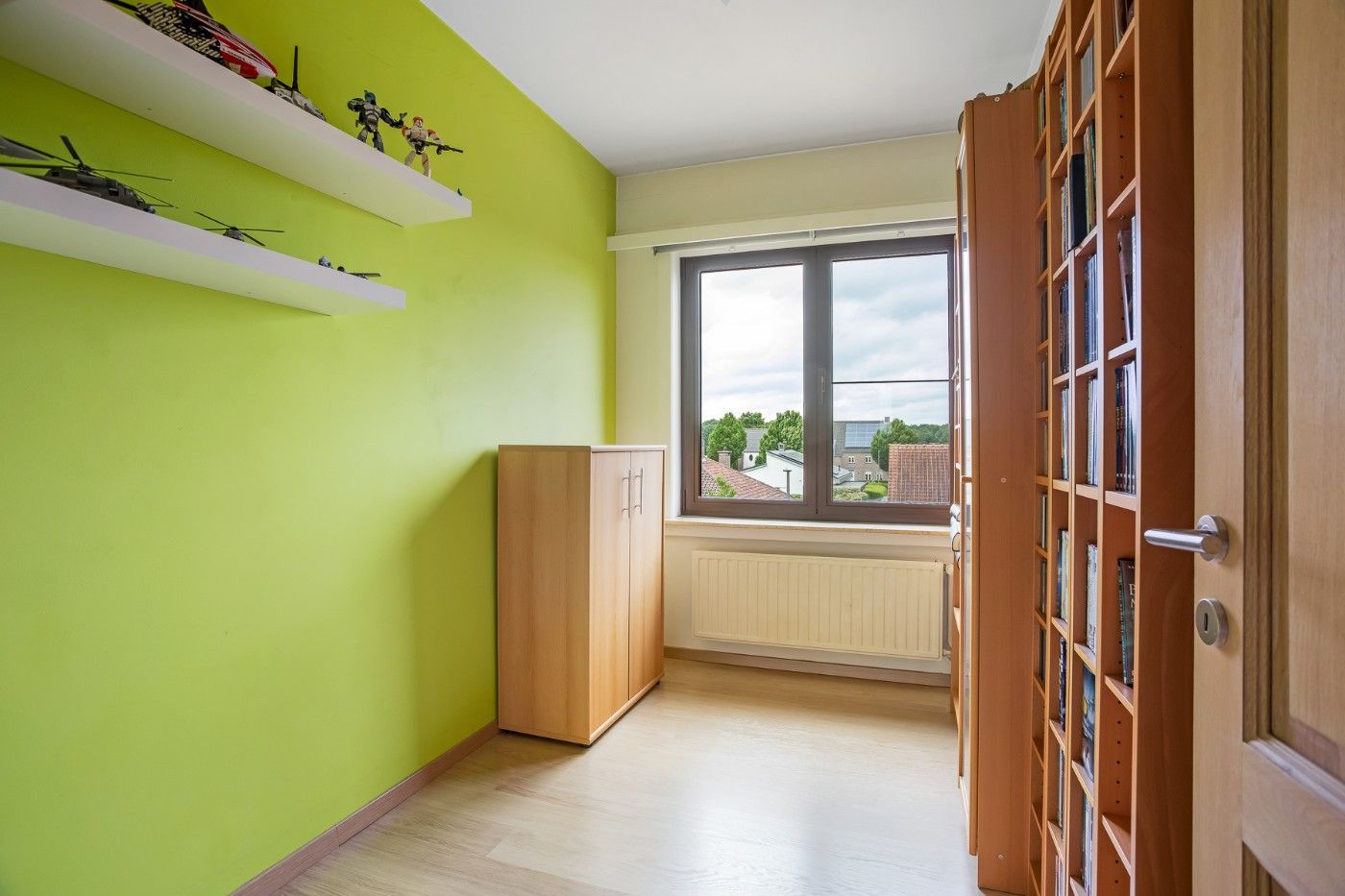 Ruime, instapklare bel-etagewoning met 3 slpk., inpandige garage en tuin foto 21