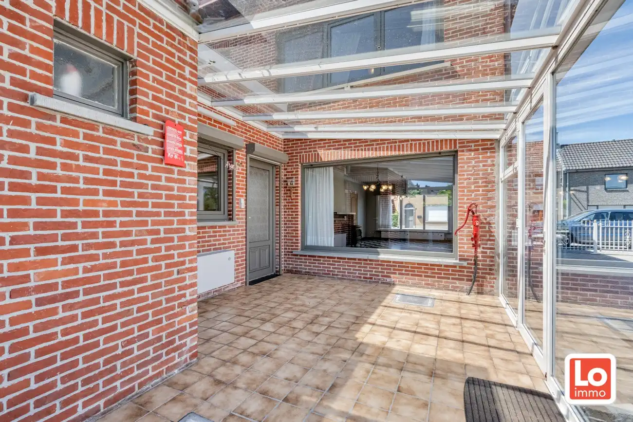 Verder te renoveren halfopen woning en afzonderlijke dubbele garage en stadstuin op een gemakkelijk bereikbare locatie in Hamme! foto 12