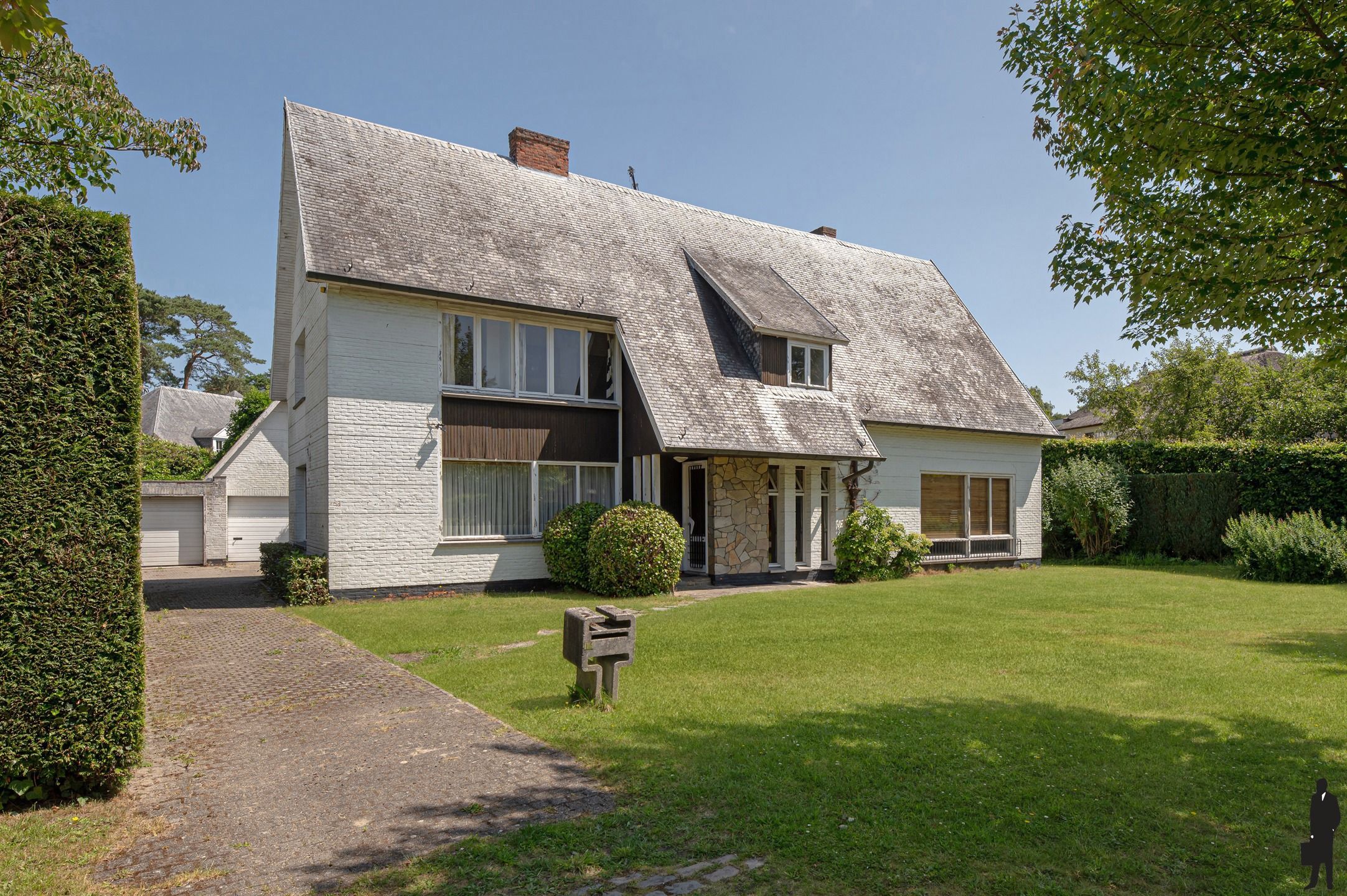 Zonnige villa met karakter & potentieel in hartje Brasschaat foto 2