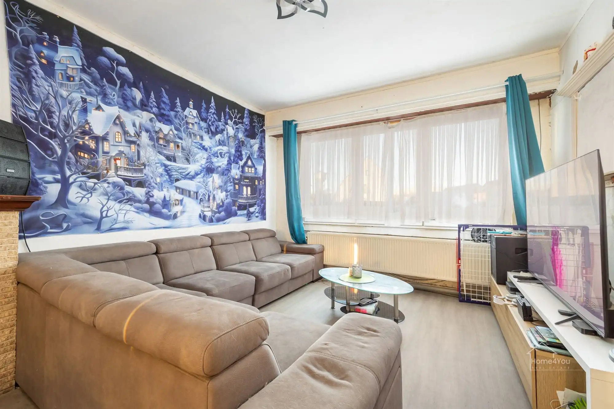 Op te frissen woning met zéér ruime extra zolder foto 4